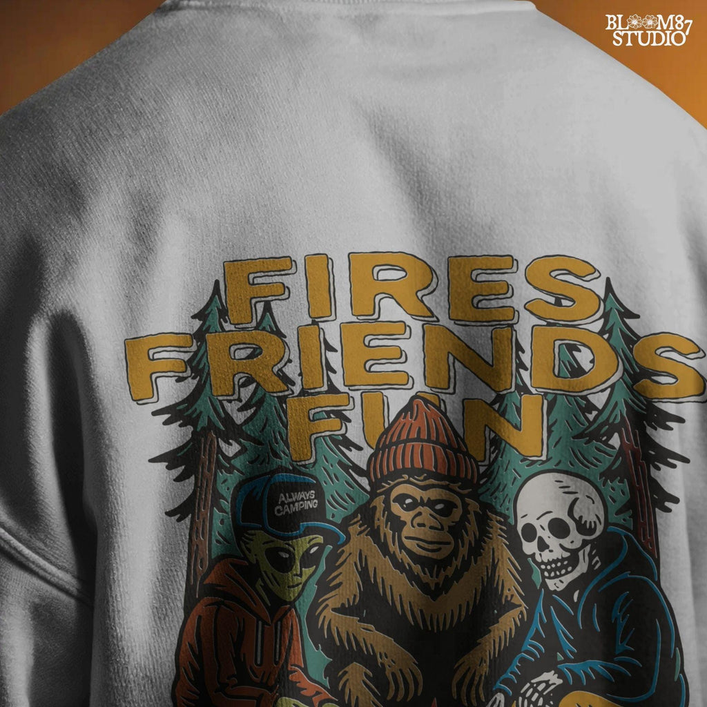 Funny cartoon-style illustration of an alien, bigfoot, and skeleton sitting around a campfire with the text “Fires. Friends. Fun. Camping Crew,” ideal for camping humor designs.