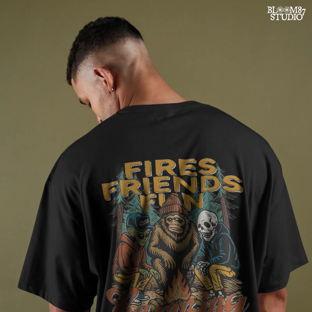 Funny cartoon-style illustration of an alien, bigfoot, and skeleton sitting around a campfire with the text “Fires. Friends. Fun. Camping Crew,” ideal for camping humor designs.