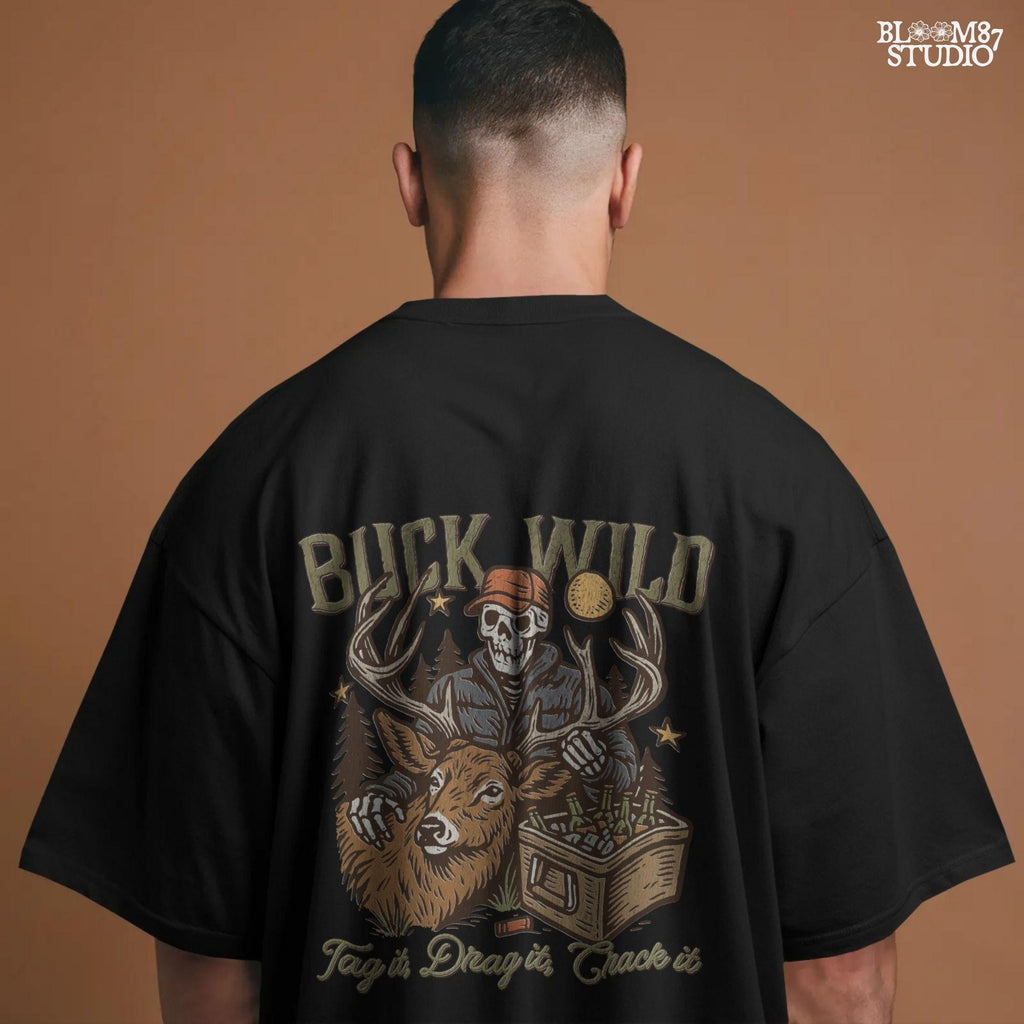 A funny deer hunting illustration with a skeleton hunter holding a buck and cooler of beer under the phrase “Tag it, Drag it, Crack it”.