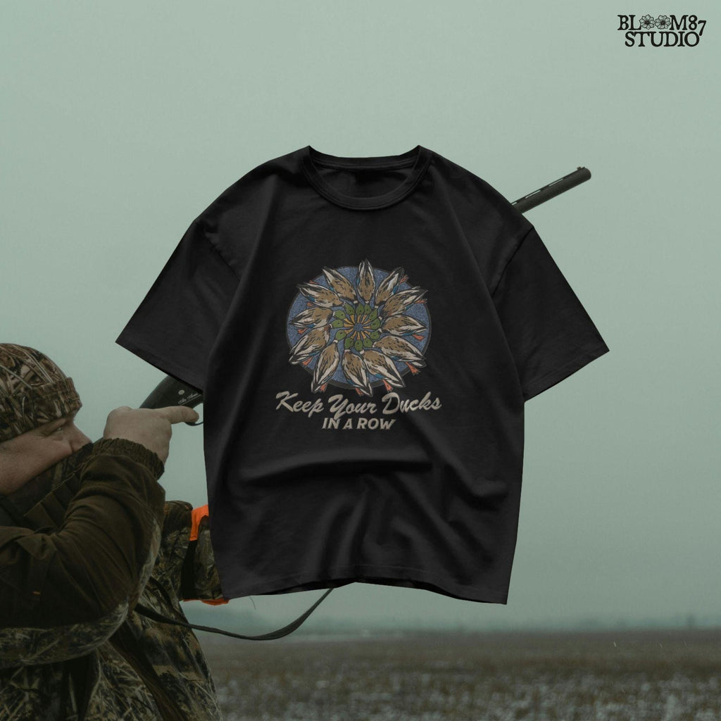 Mandala-style illustration of mallard ducks in a circular arrangement with the phrase “Keep Your Ducks in a Row” – sublimation PNG for hunters and outdoorsmen.