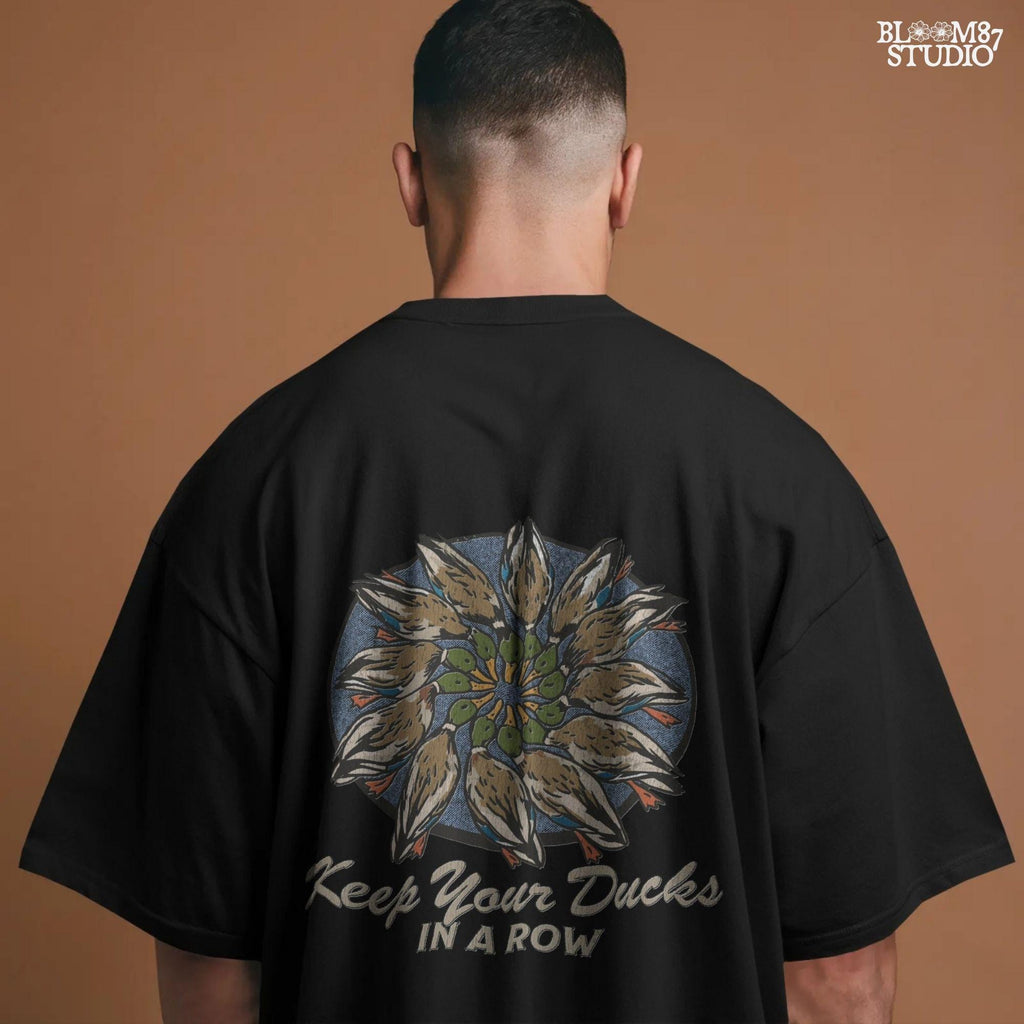 Mandala-style illustration of mallard ducks in a circular arrangement with the phrase “Keep Your Ducks in a Row” – sublimation PNG for hunters and outdoorsmen.