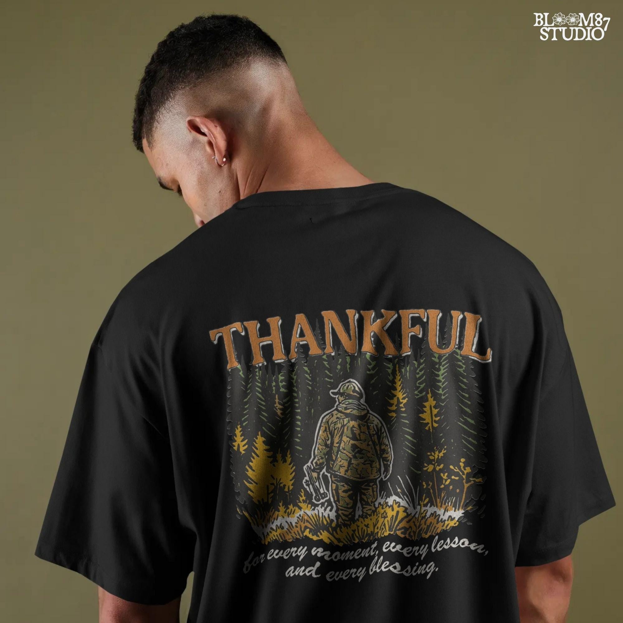 Illustration of a hunter in camo standing in a fall forest with the word “THANKFUL” above and a quote below, designed for sublimation projects.