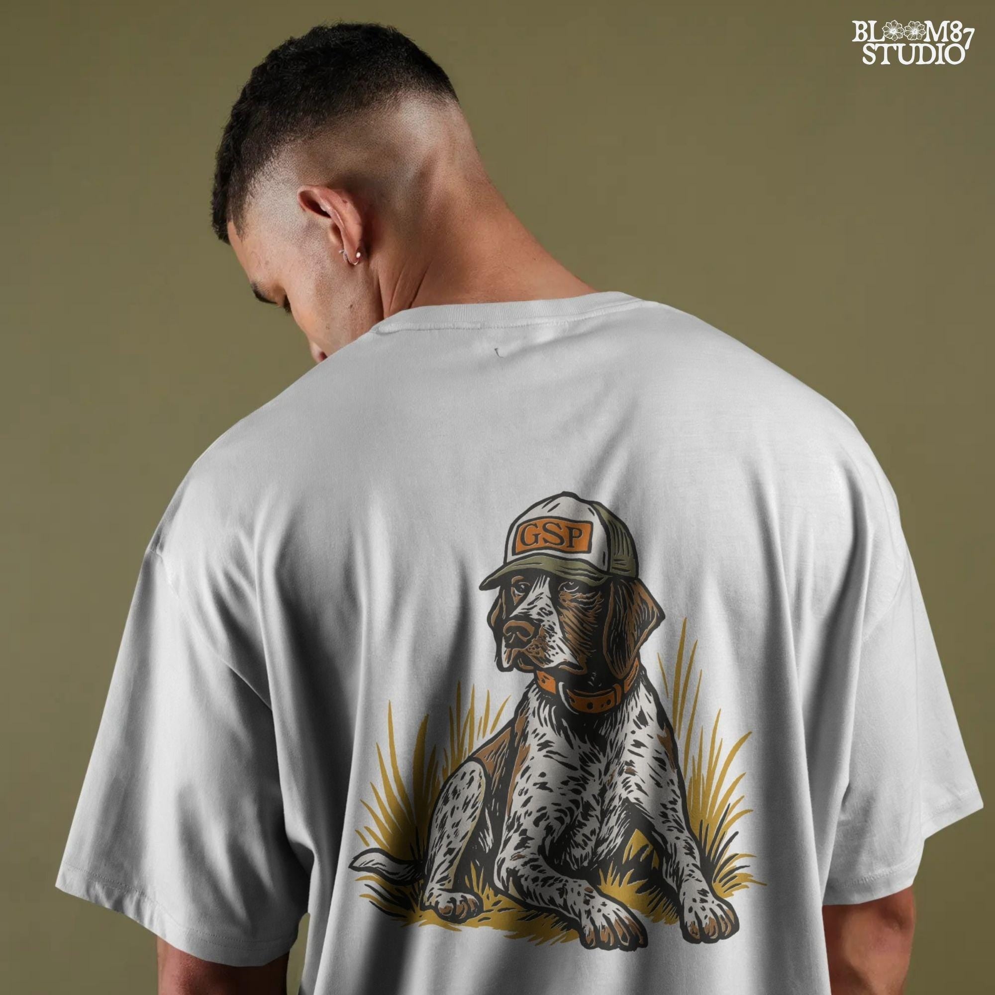 Illustration of a German Shorthaired Pointer dog wearing a GSP hat and orange collar, sitting in golden grass, perfect for hunting or fall-themed sublimation.