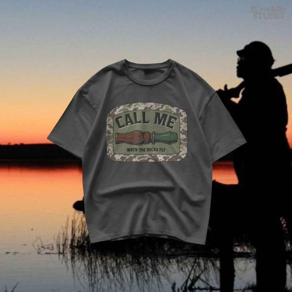 Sublimation PNG design featuring a duck call with camo border and the phrase “Call Me When The Ducks Fly” for hunting or outdoors shirts