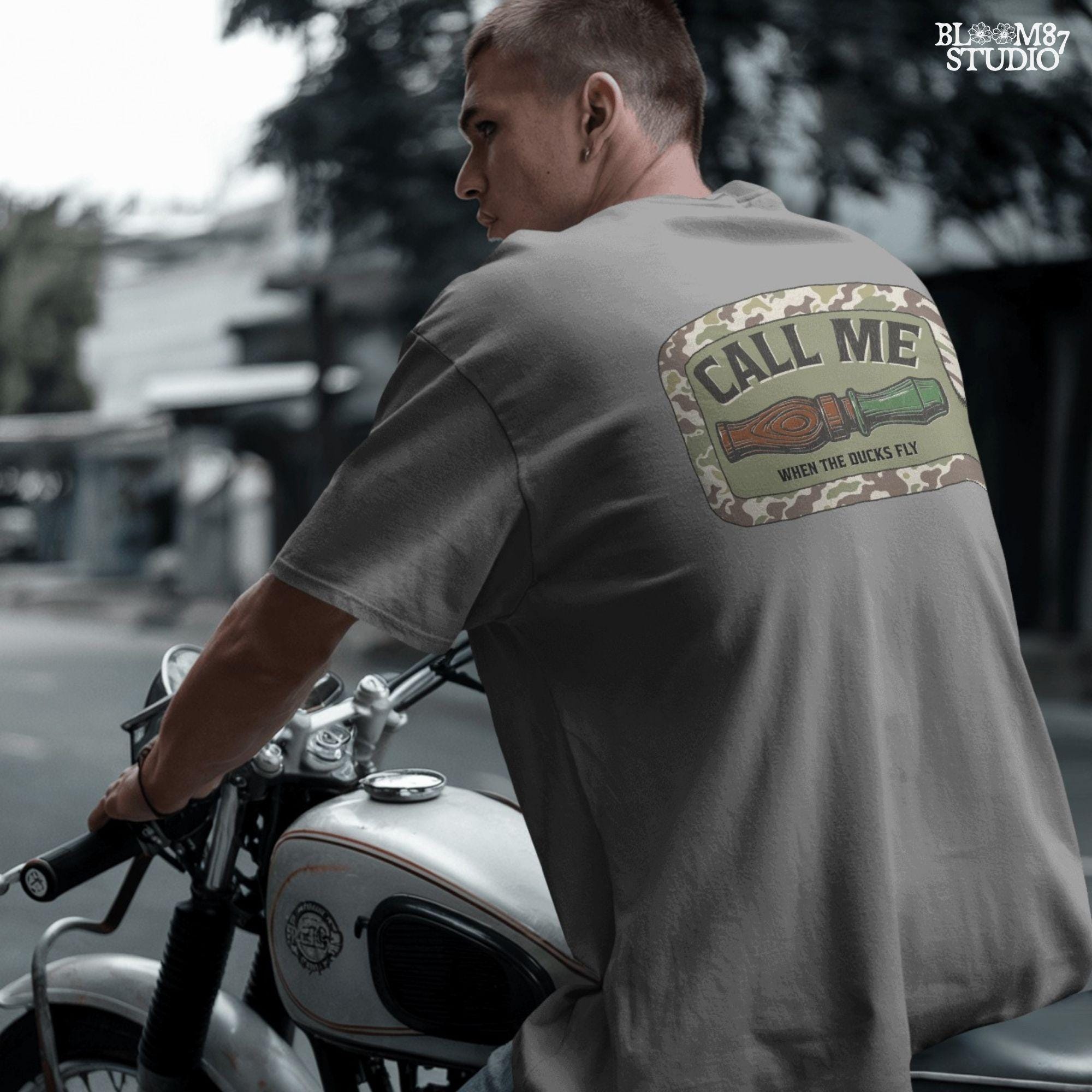 Sublimation PNG design featuring a duck call with camo border and the phrase “Call Me When The Ducks Fly” for hunting or outdoors shirts