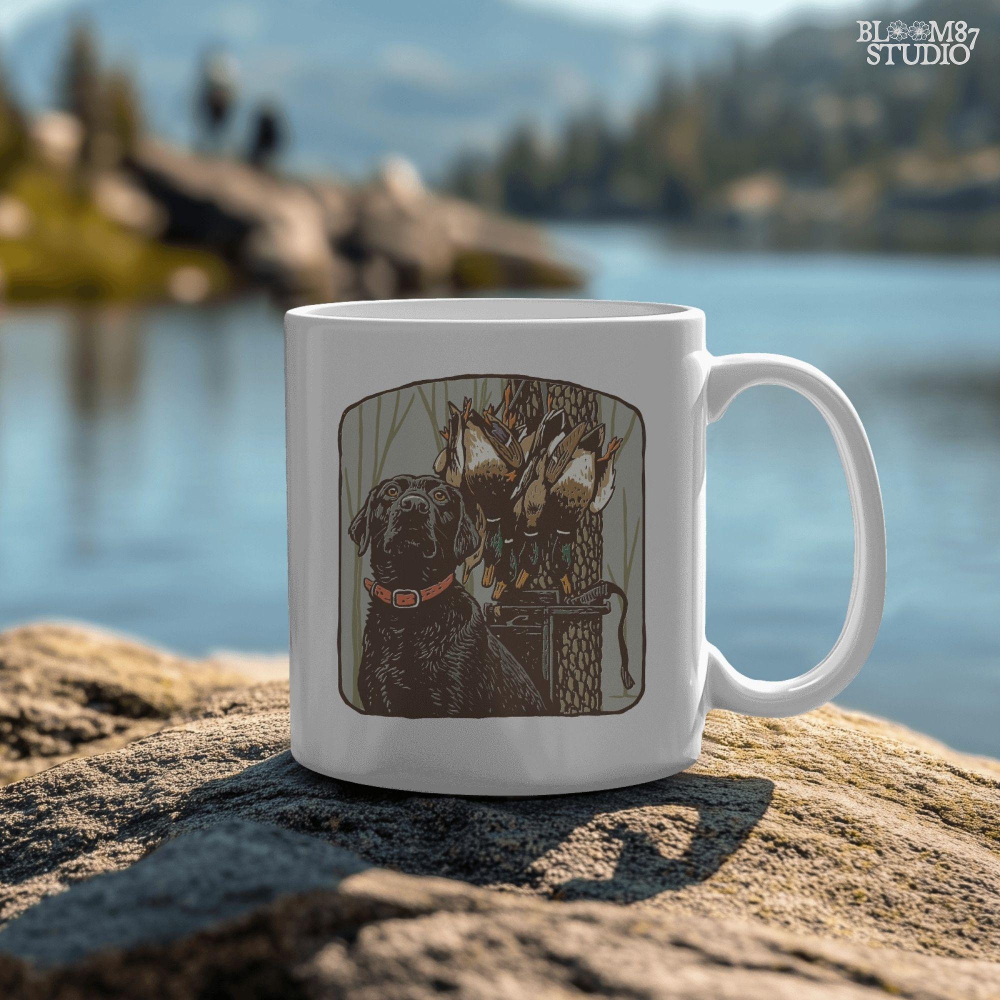 Digital PNG design of a black lab hunting dog with mallard ducks on a strap, ideal for sublimation printing on hunting-themed apparel