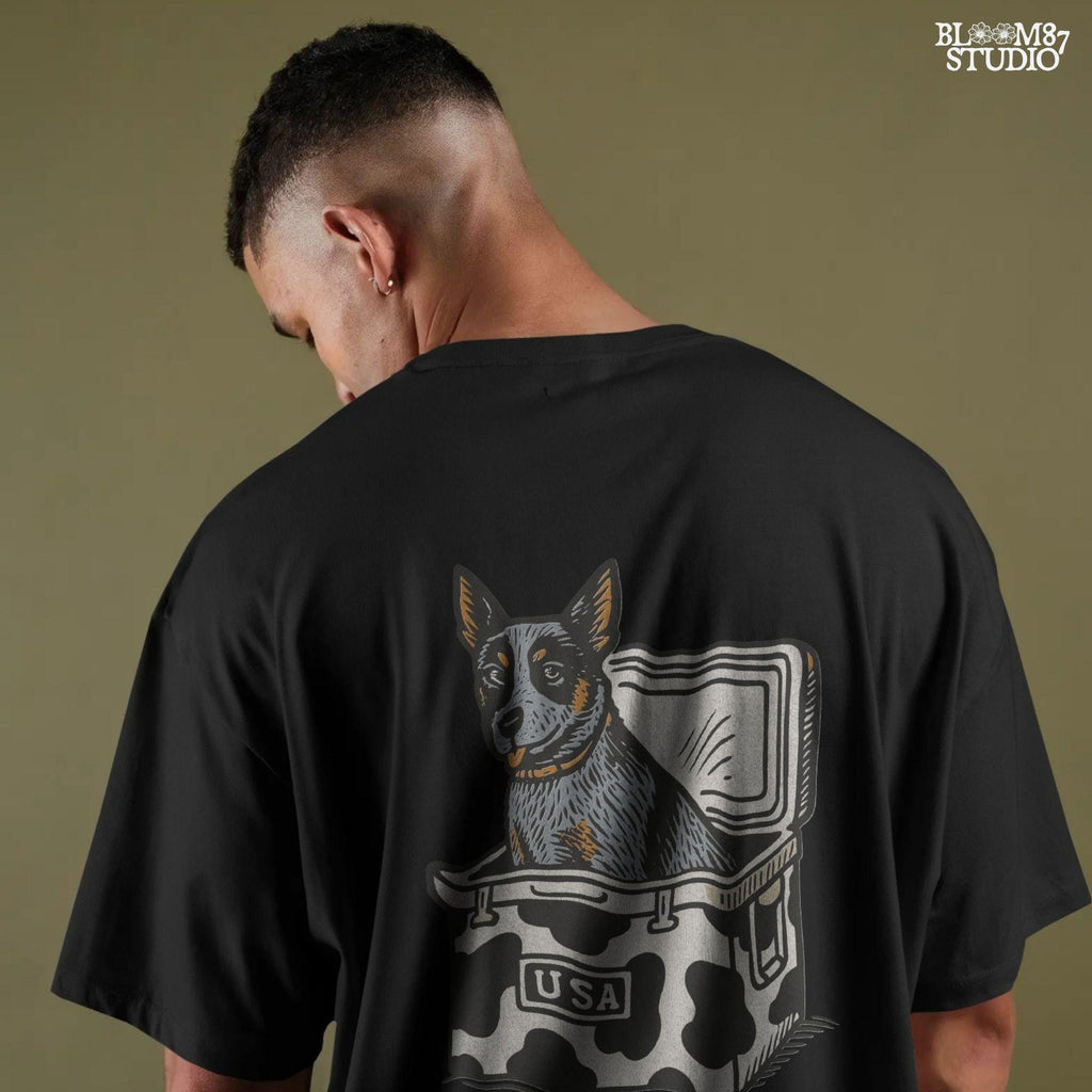 Cartoon-style Blue Heeler dog sitting inside a cowprint cooler with USA patch, perfect for southern patriotic summer sublimation design.