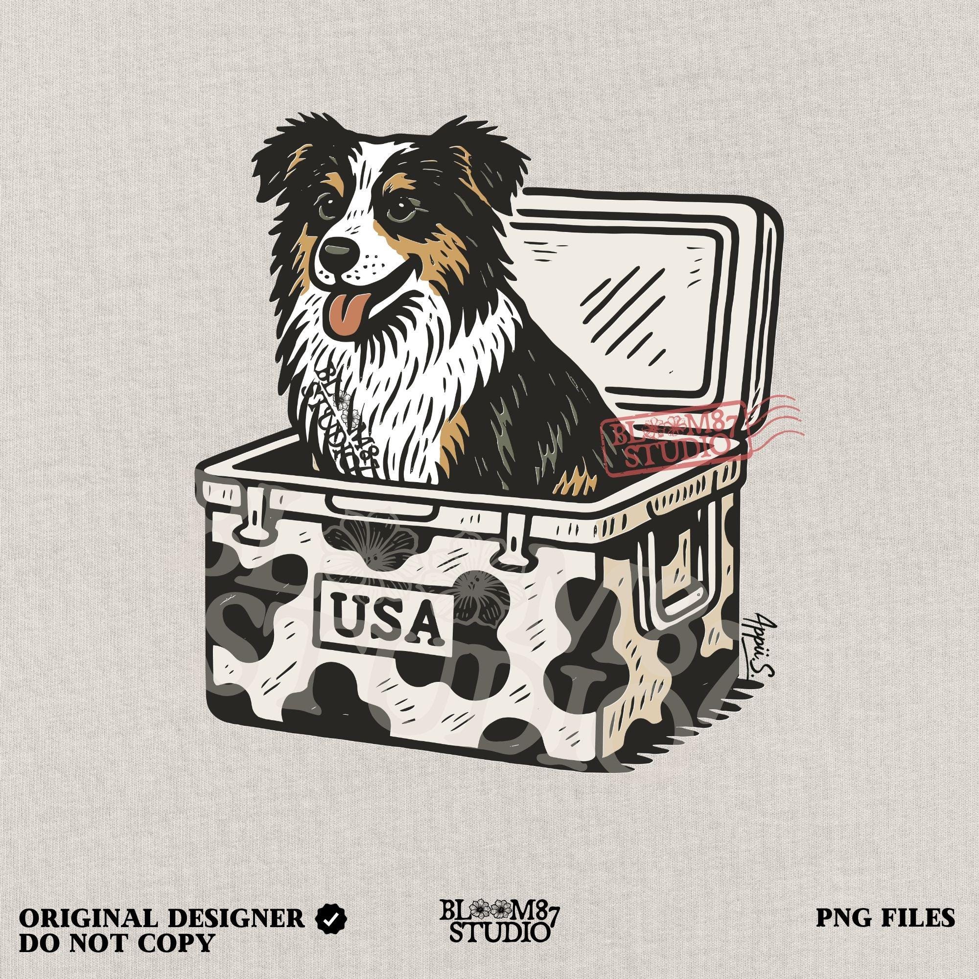 Illustration of an Australian Shepherd dog sitting inside a cowhide-pattern USA cooler; western patriotic sublimation PNG for dog lovers and crafters.