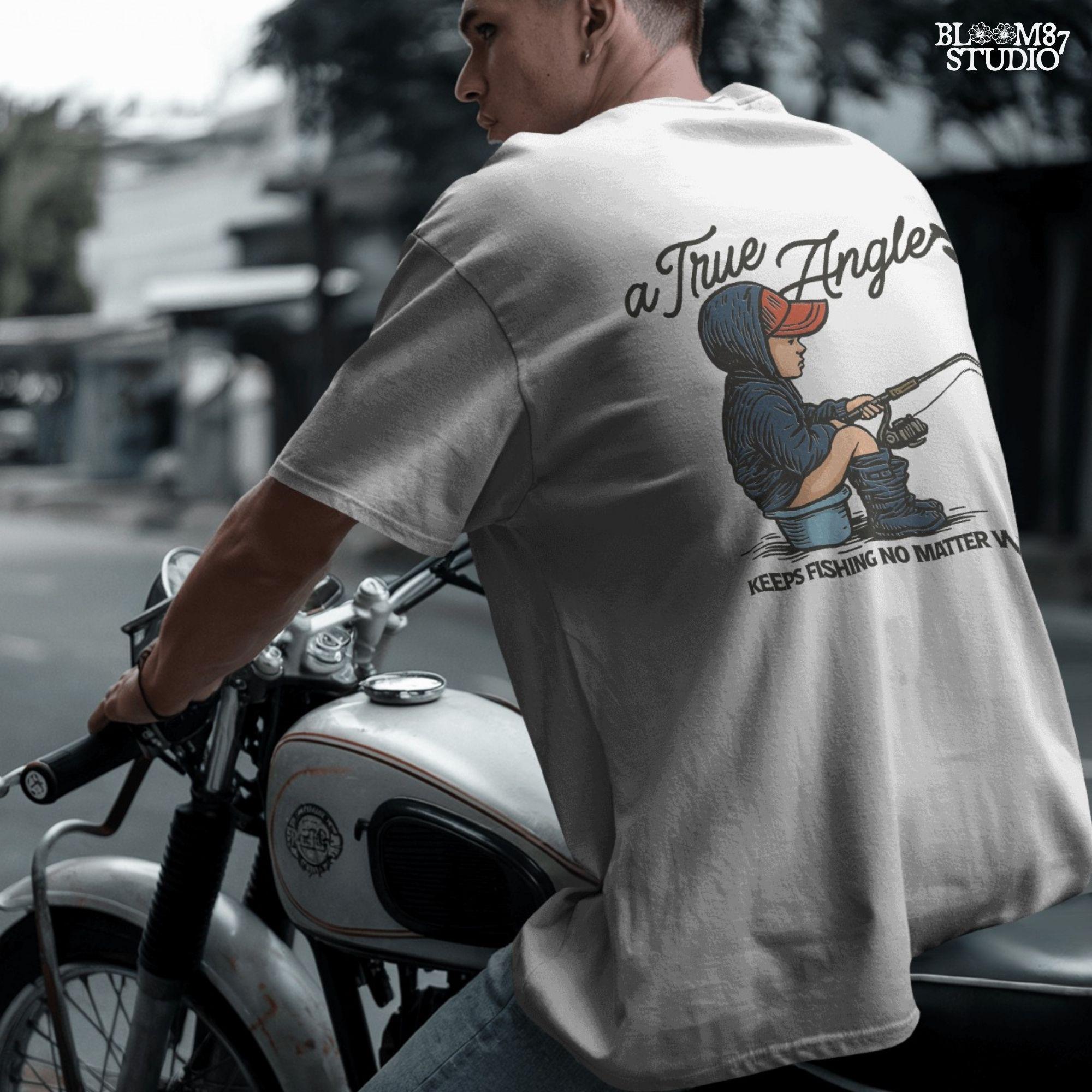 Cartoon of young boy sitting on a bucket in hoodie and boots, fishing with full focus, with the quote “A True Angler Keeps Fishing No Matter What.”