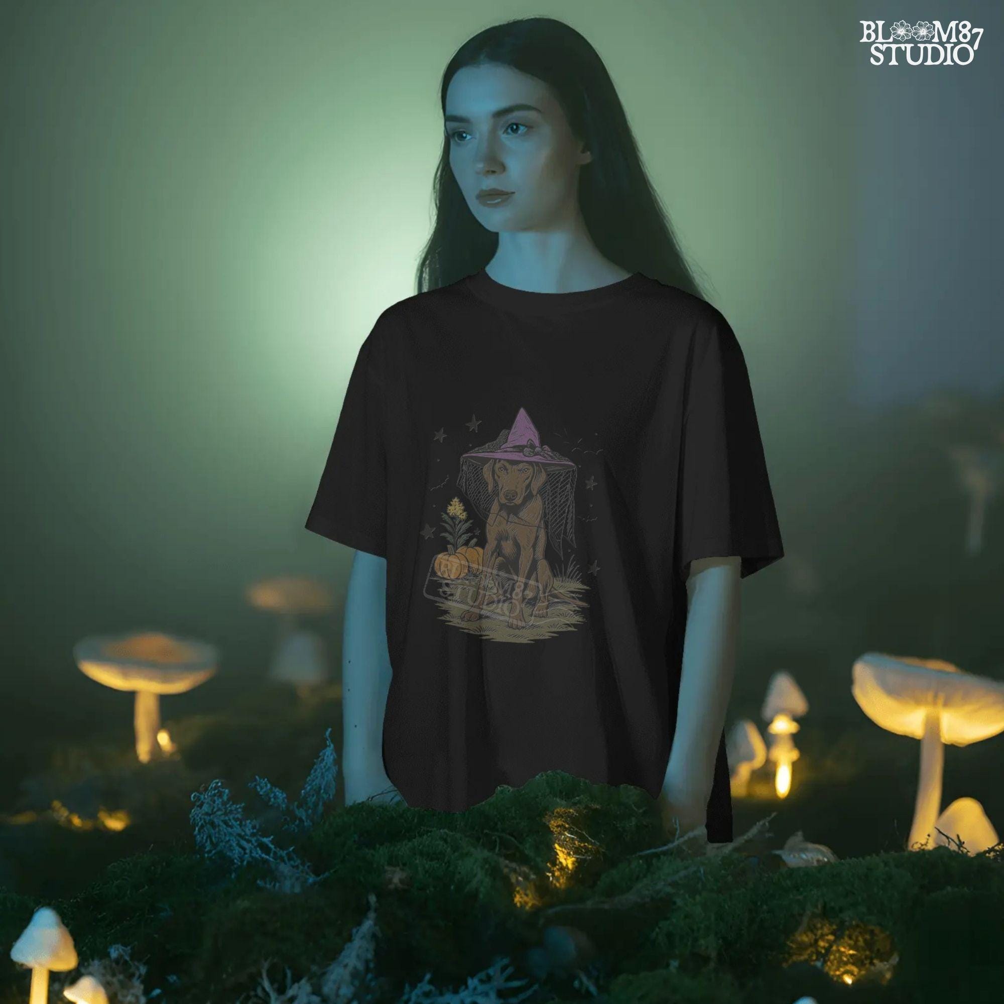 Illustration of a brown labrador wearing a witch hat, sitting in grass with pumpkins and stars in the background, in Halloween spooky style.