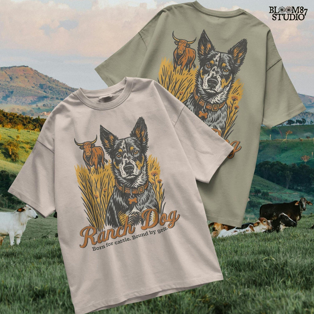 Vintage-style illustration of an Australian cattle dog sitting in a field with a longhorn cow behind, and the phrase “Ranch Dog – Born for cattle. Bound by grit.”