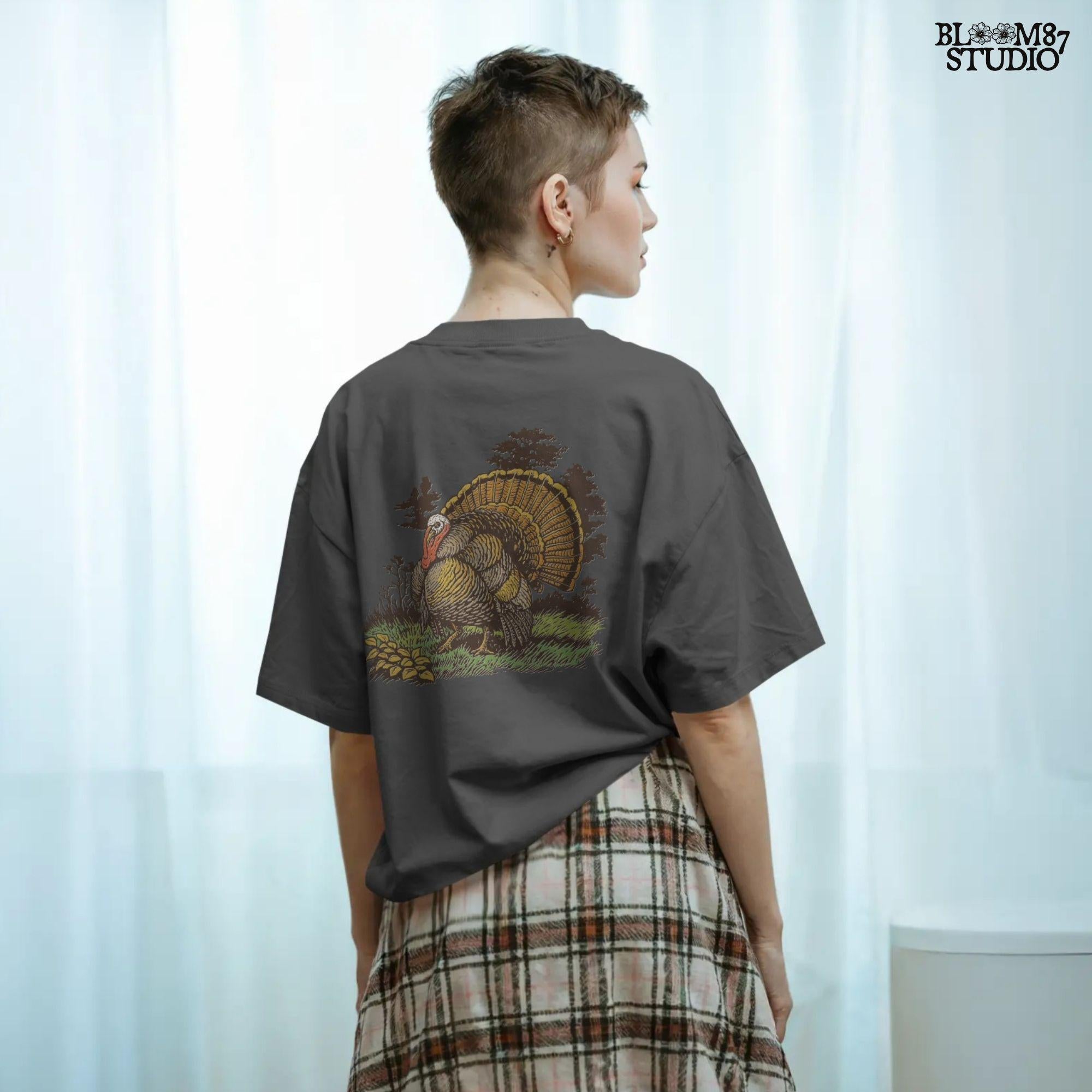 Vintage turkey illustration for Thanksgiving sublimation, featuring a detailed rustic tom turkey in fall colors with grass and leaves.