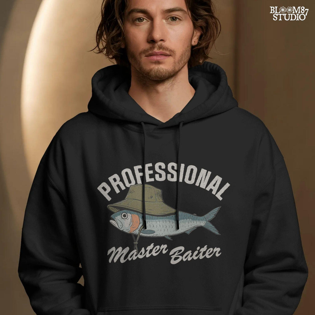Funny fishing sublimation PNG with a fish wearing a green bucket hat and the words “Professional Master Baiter” in vintage bold font.