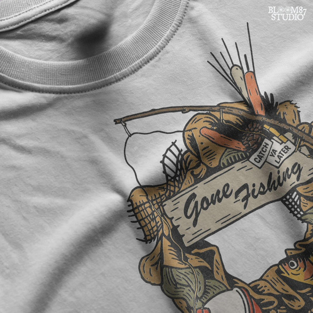 Rustic “Gone Fishing” wreath PNG design featuring bobber, fishing gear, reeds, yellow fish, and a wooden sign, perfect for sublimation on shirts and decor.