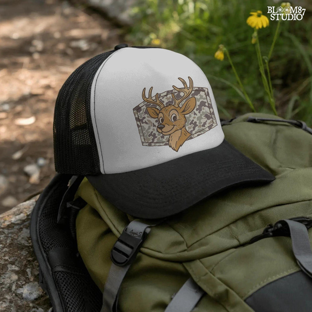 Cartoon deer with big antlers in front of a camouflage background – sublimation PNG design for fall, back to school, or kids’ hunting season shirts.