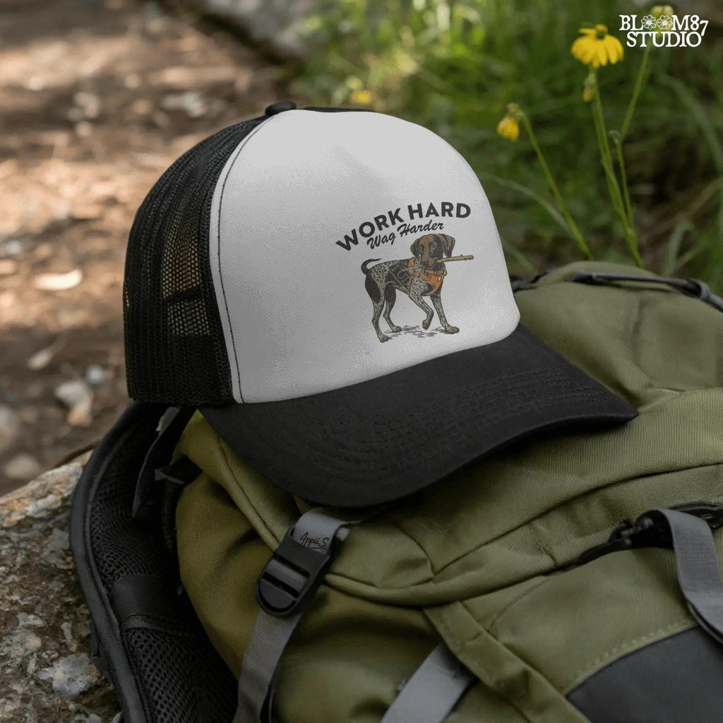 German Shorthaired Pointer dog wearing orange harness holding a stick with text “Work Hard Wag Harder” above, PNG design for sublimation use