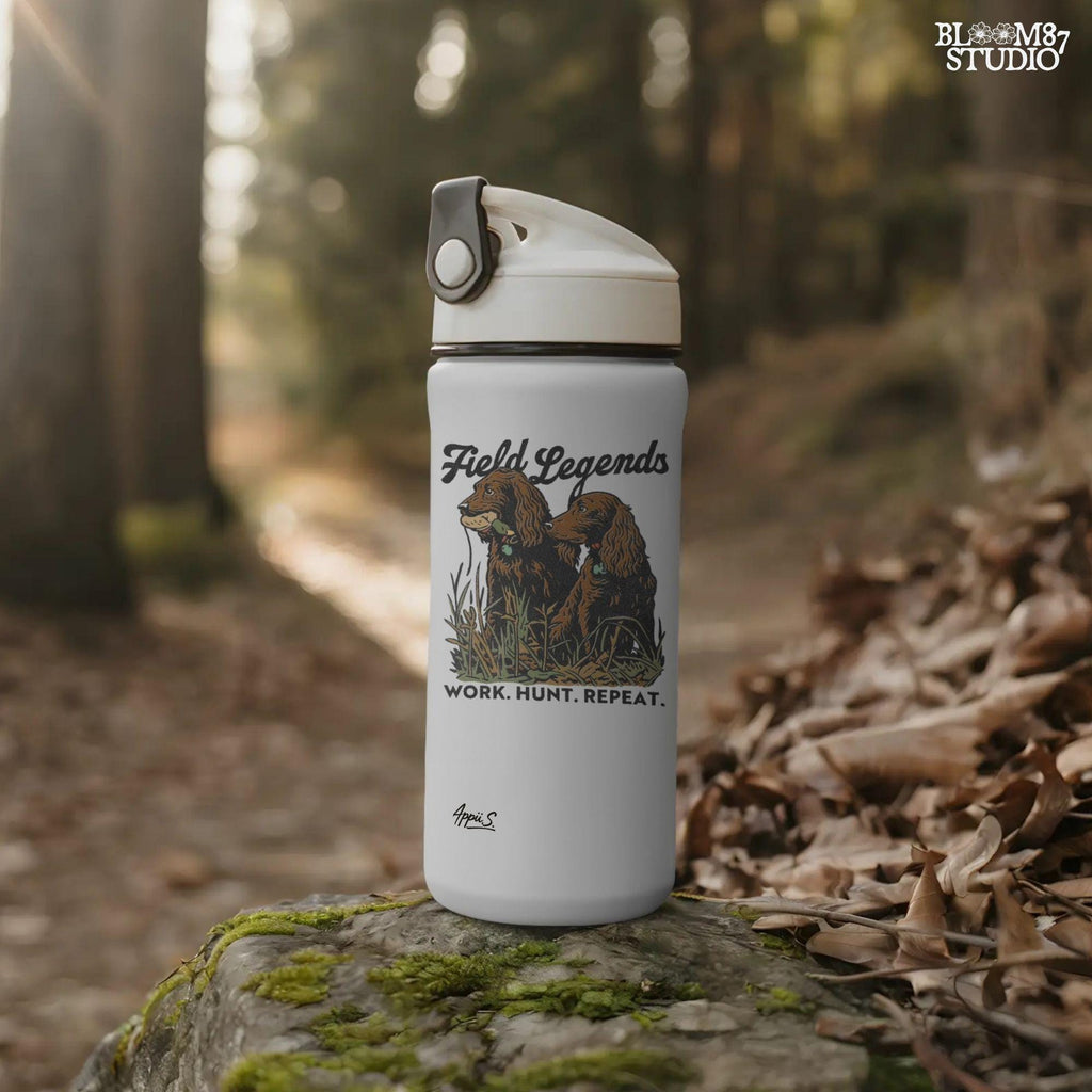 Vintage-style illustration of two retriever hunting dogs sitting in tall grass with text “Field Legends” and “Work. Hunt. Repeat.” – PNG for sublimation use