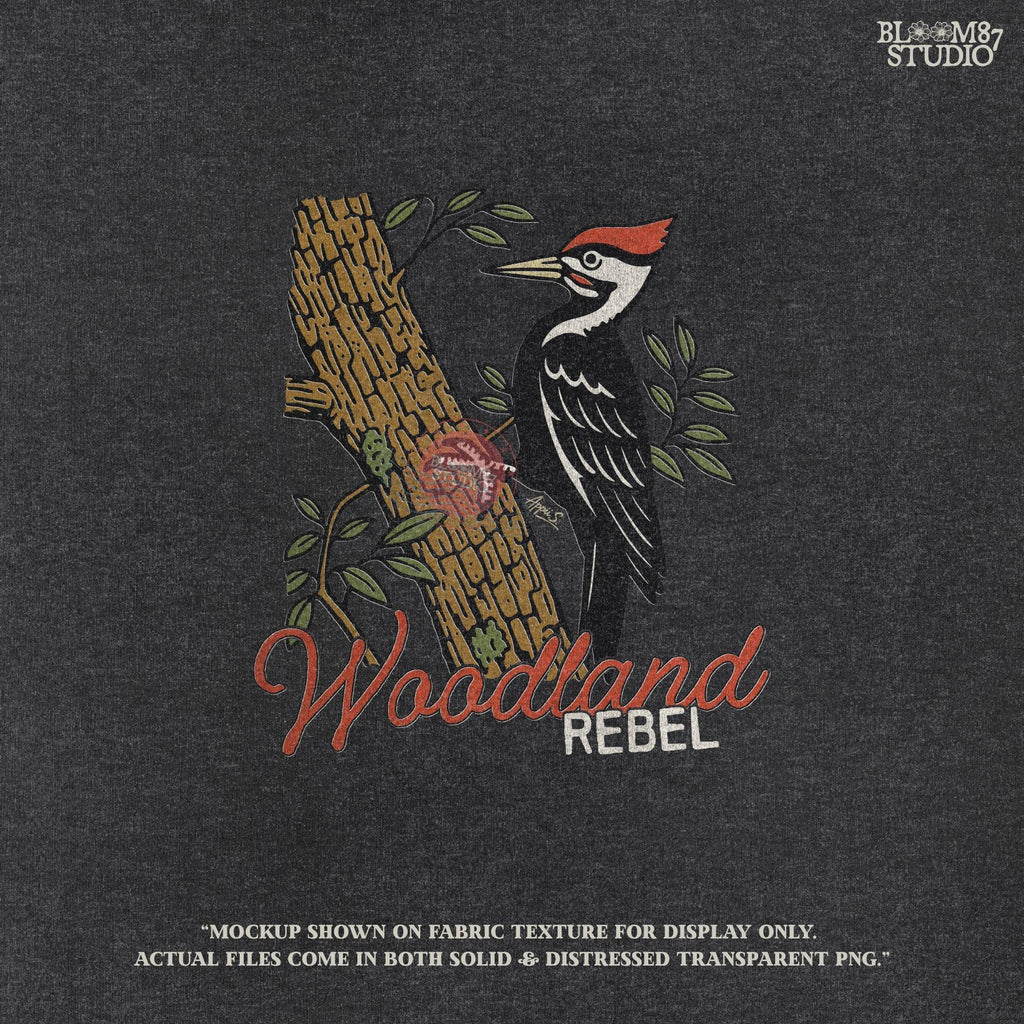 Vintage woodpecker perched on a tree trunk with green leaves and the word “Woodland” in rustic script, fall-themed forest sublimation PNG.