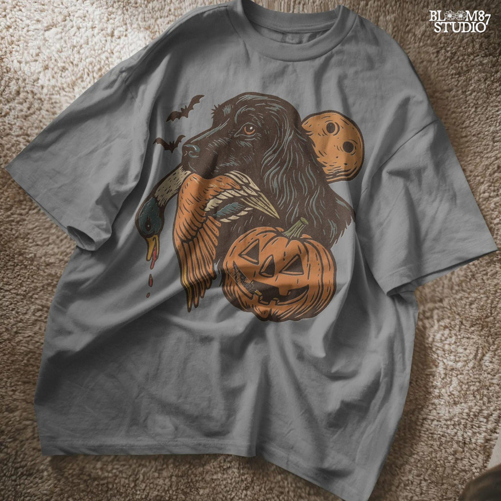 Halloween PNG of a black hunting dog holding a duck with jack-o’-lanterns, bats, and a full moon, rustic sublimation for fall crafts