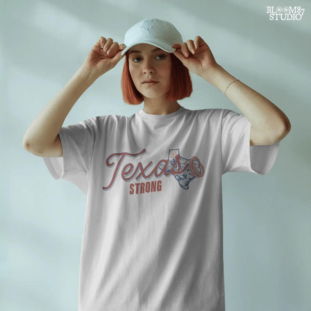 “Texas Strong sublimation PNG design featuring Texas state outline with desert scene, cactus, sun, and rope lasso, for flood relief and western-themed crafts”