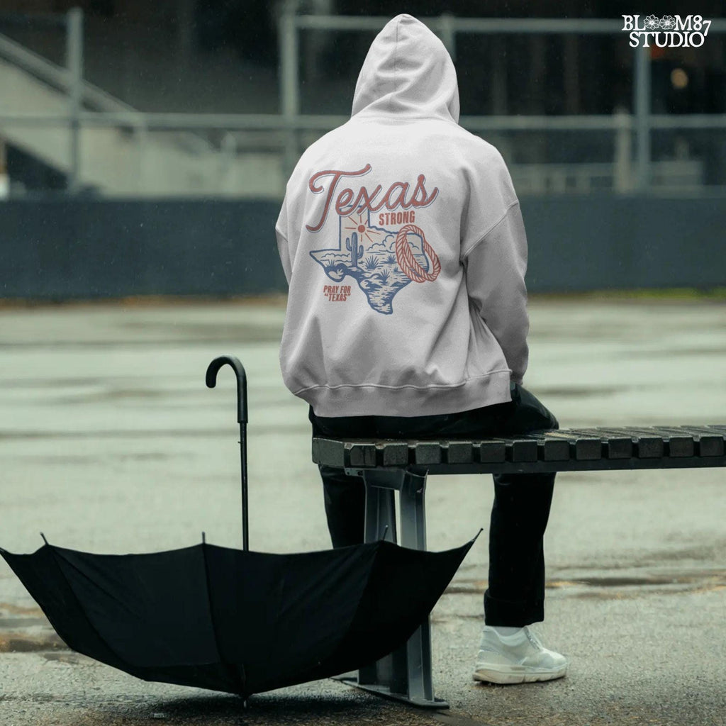 “Texas Strong sublimation PNG design featuring Texas state outline with desert scene, cactus, sun, and rope lasso, for flood relief and western-themed crafts”