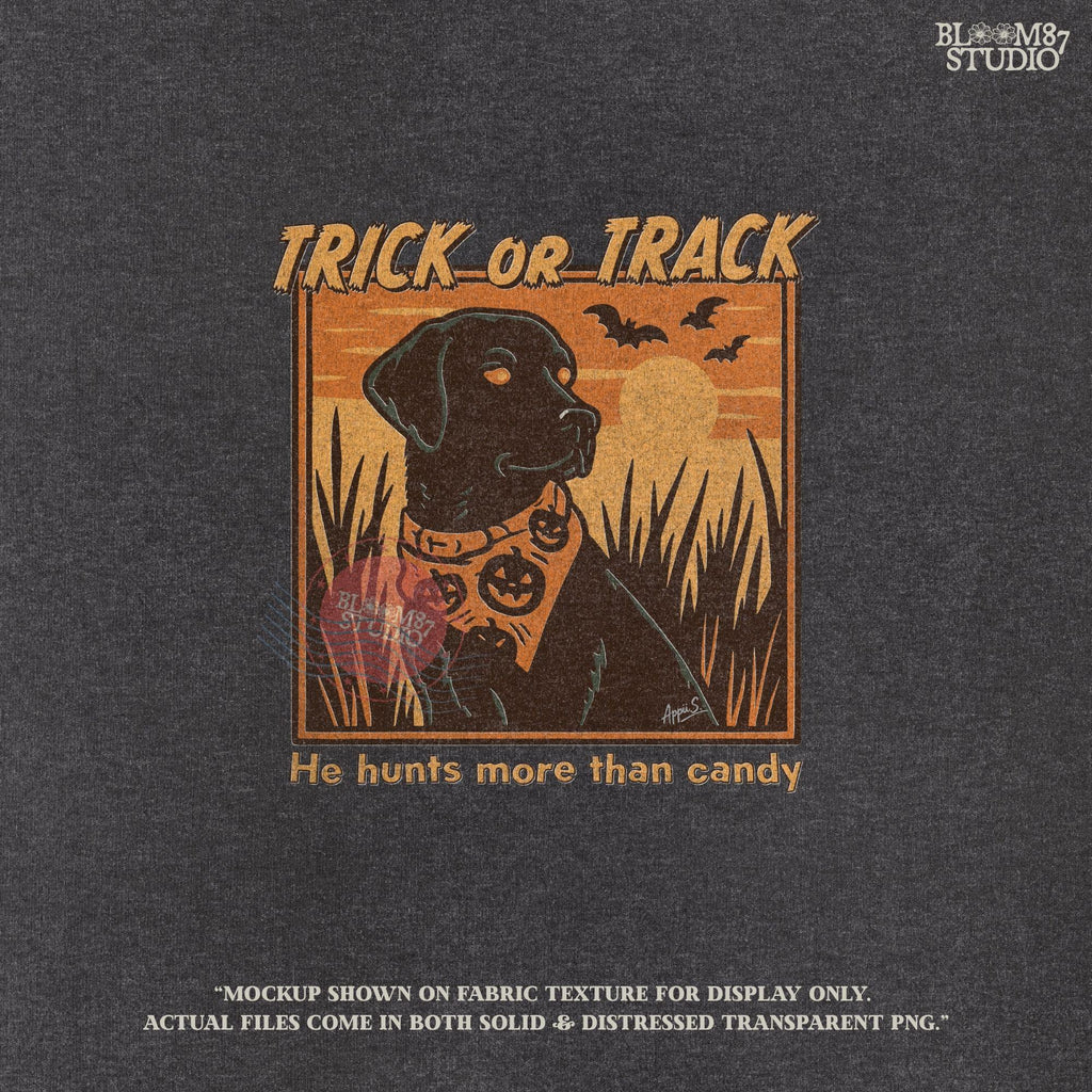Halloween PNG of a black lab hunting dog wearing a pumpkin bandana with bats, sunset, and text “Trick or Track – He Hunts More Than Candy”