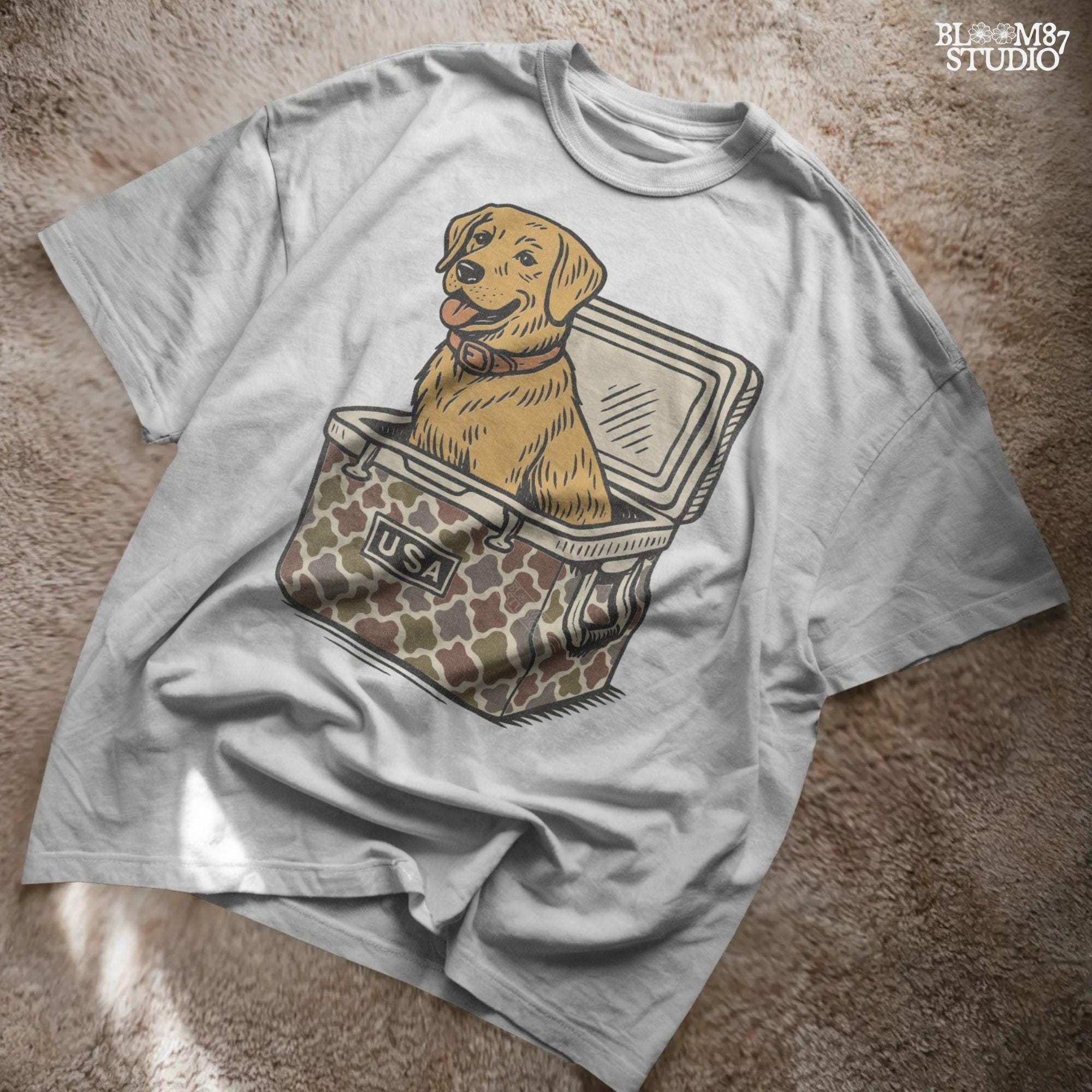 Yellow Labrador Retriever sitting inside a camouflage USA cooler, digital PNG sublimation design for fall hunting or outdoors crafting