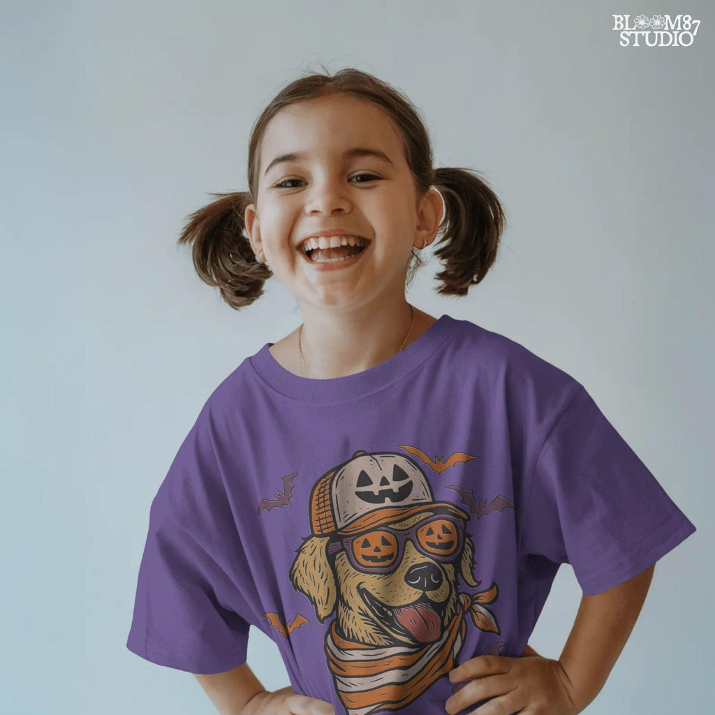 Golden retriever wearing jack-o’-lantern sunglasses, pumpkin hat, and orange bandana, surrounded by bats, Halloween-themed sublimation PNG