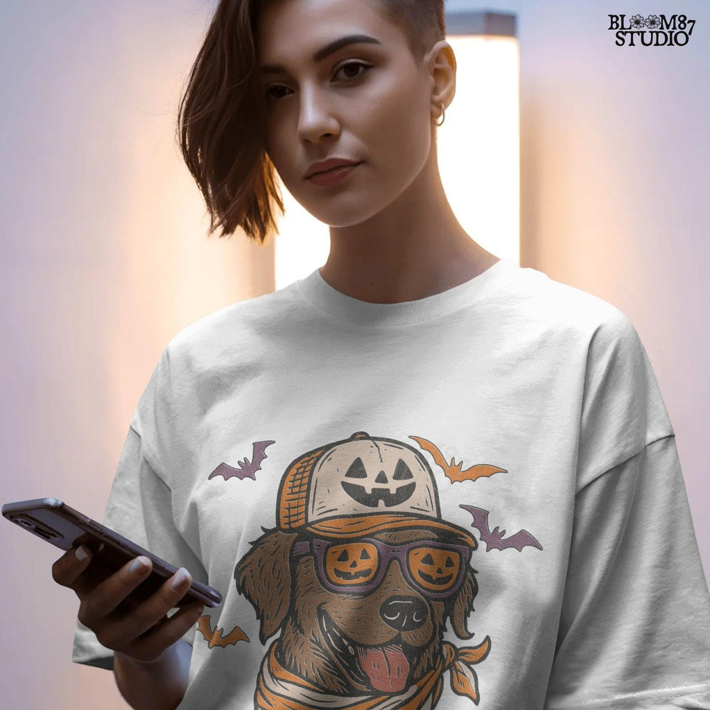 Chocolate labrador wearing pumpkin hat and jack-o’-lantern sunglasses with Halloween bats and orange bandana, Halloween sublimation PNG design