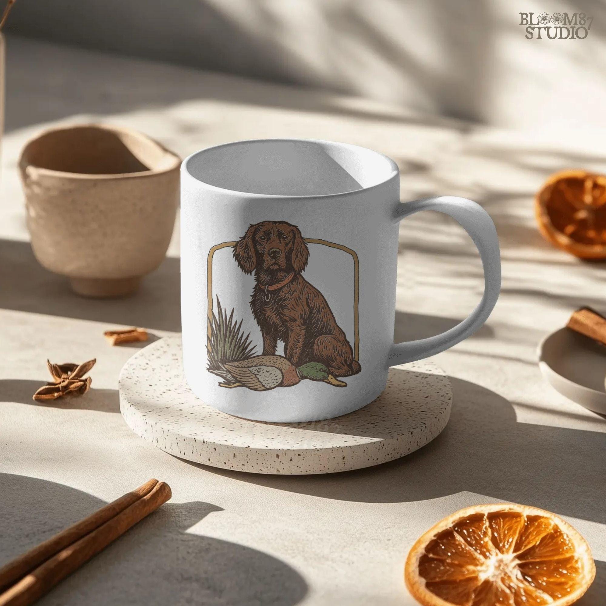 Vintage-style PNG of a Boykin Spaniel dog sitting with a harvested mallard duck, perfect for fall hunting sublimation and Southern dog lovers