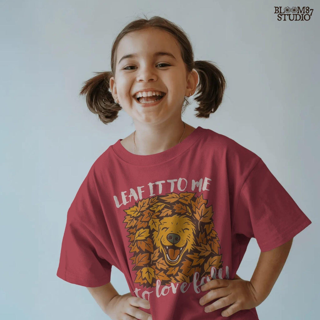 Cute golden retriever surrounded by fall leaves with the phrase “Leaf it to me to love fall”, for autumn dog-themed sublimation projects