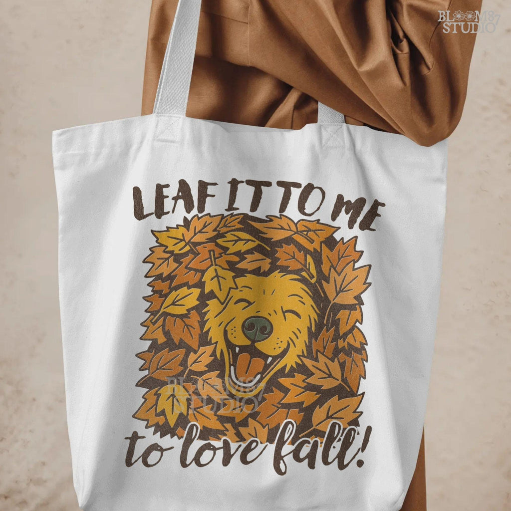 Cute golden retriever surrounded by fall leaves with the phrase “Leaf it to me to love fall”, for autumn dog-themed sublimation projects