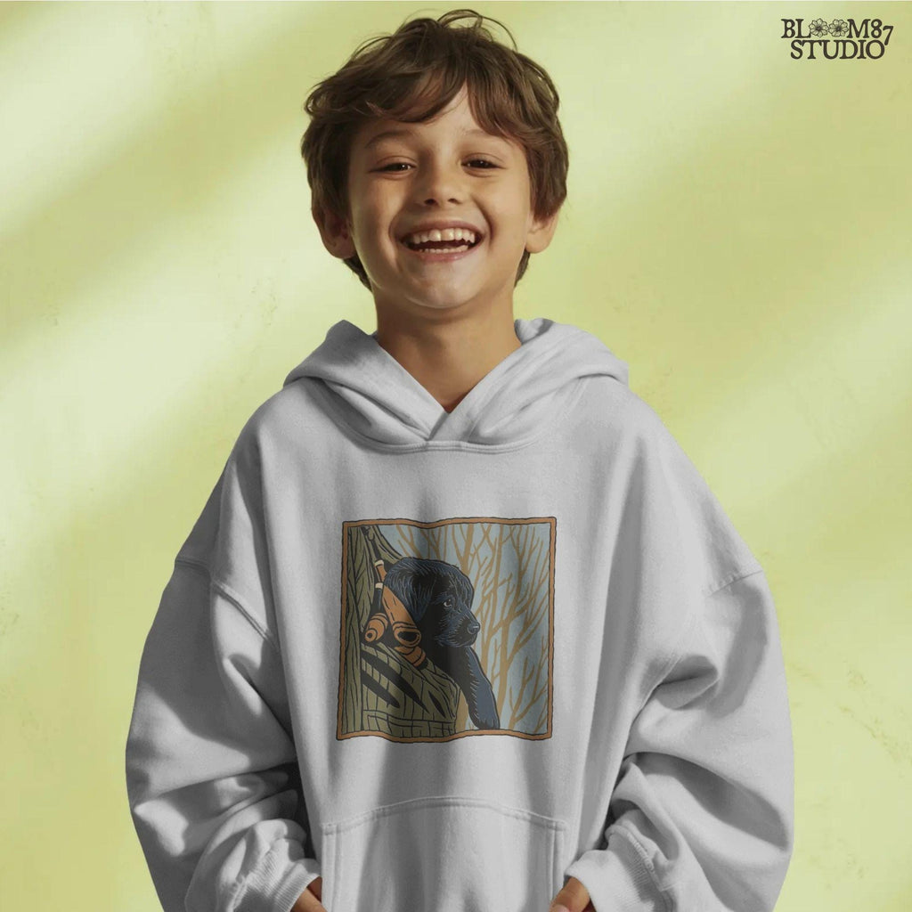 Black Labrador puppy sitting in a camo hunting vest with duck calls, perfect for fall hunting season sublimation designs.