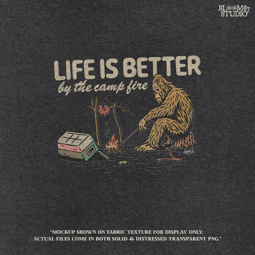 Bigfoot roasting meat over a campfire next to a tipped cooler, with the phrase “Life Is Better by the camp fire” above, illustrated PNG design for outdoor sublimation.