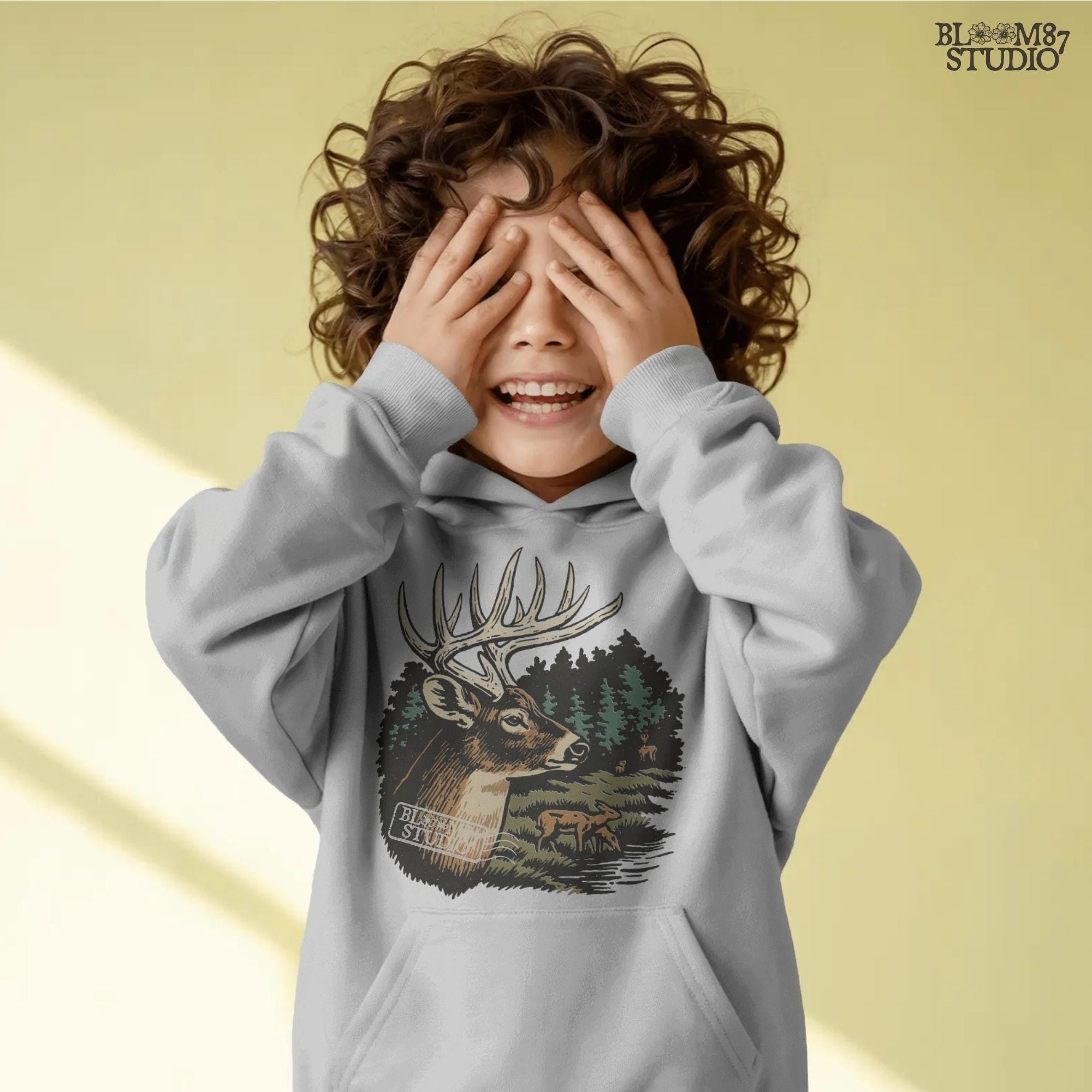 Detailed illustration of a whitetail deer buck with antlers in a forest landscape, surrounded by trees and a doe family, for sublimation designs.