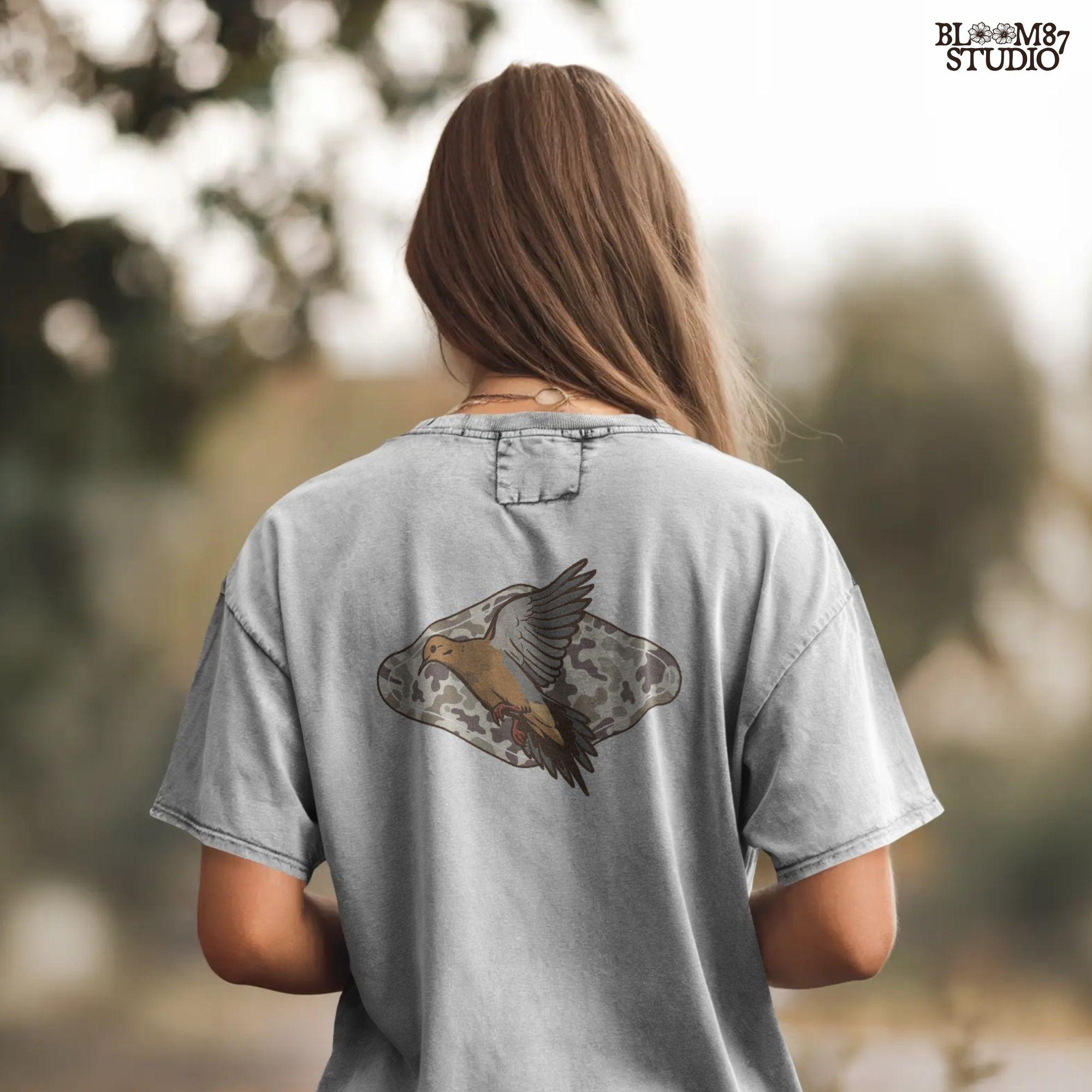 Illustration of a flying mourning dove over a tan and brown camo-patterned background, designed for hunting-themed sublimation prints.