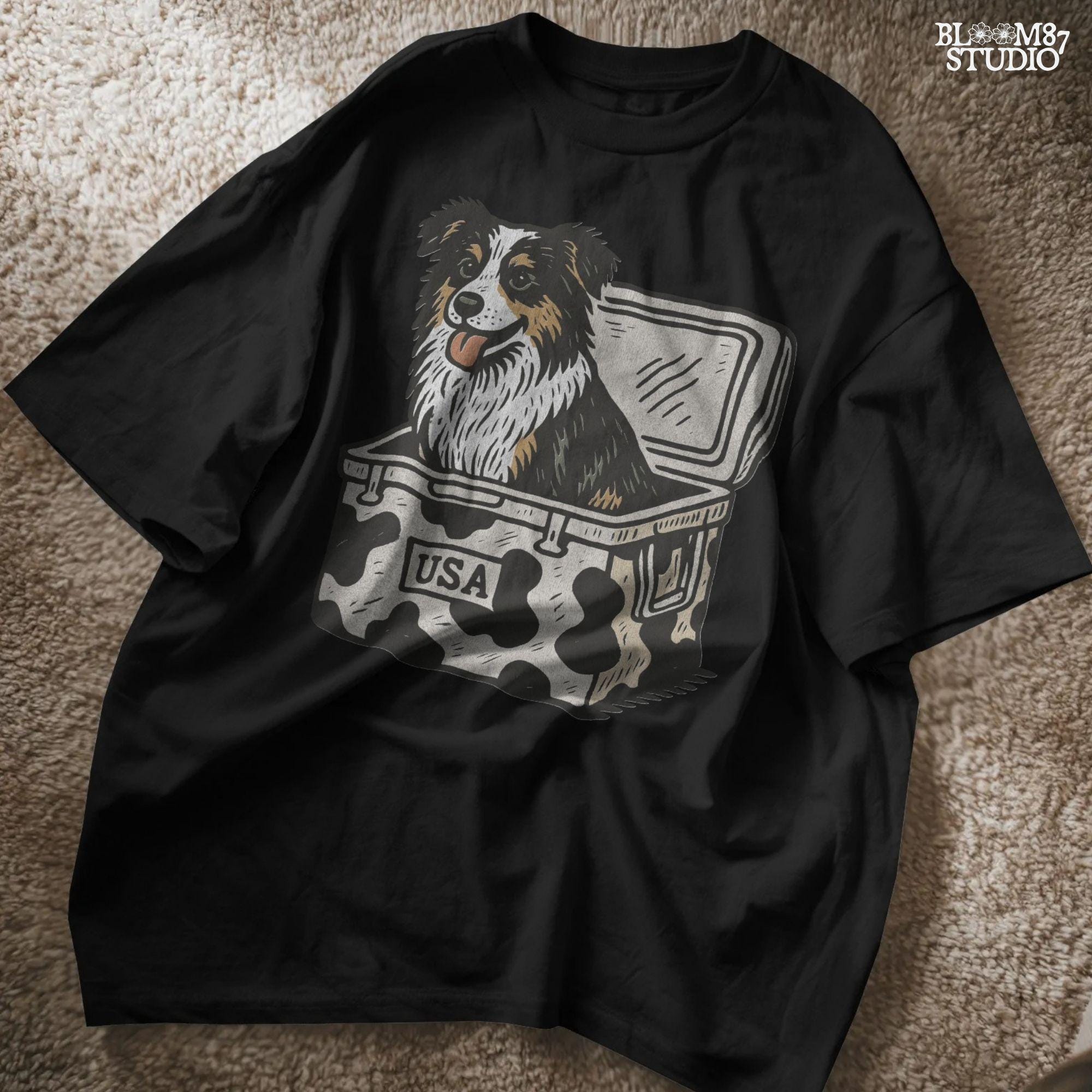 Illustration of an Australian Shepherd dog sitting inside a cowhide-pattern USA cooler; western patriotic sublimation PNG for dog lovers and crafters.