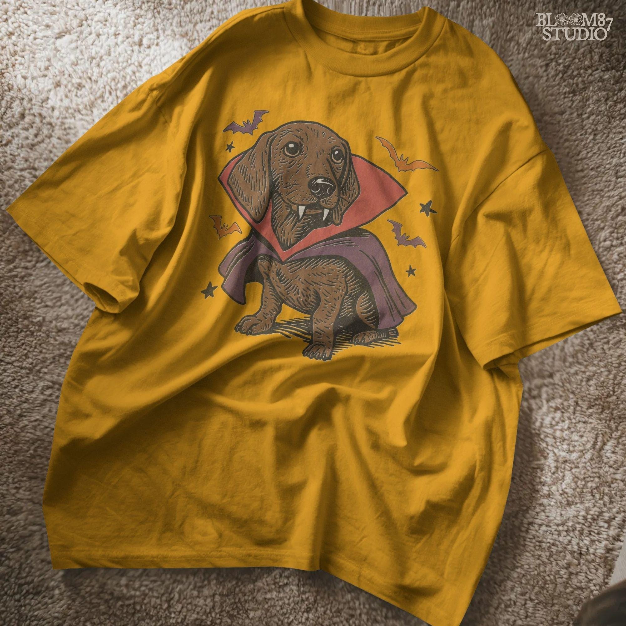 Cute dachshund dressed as a Halloween vampire with red and purple cape, fangs, and surrounded by bats on transparent background.