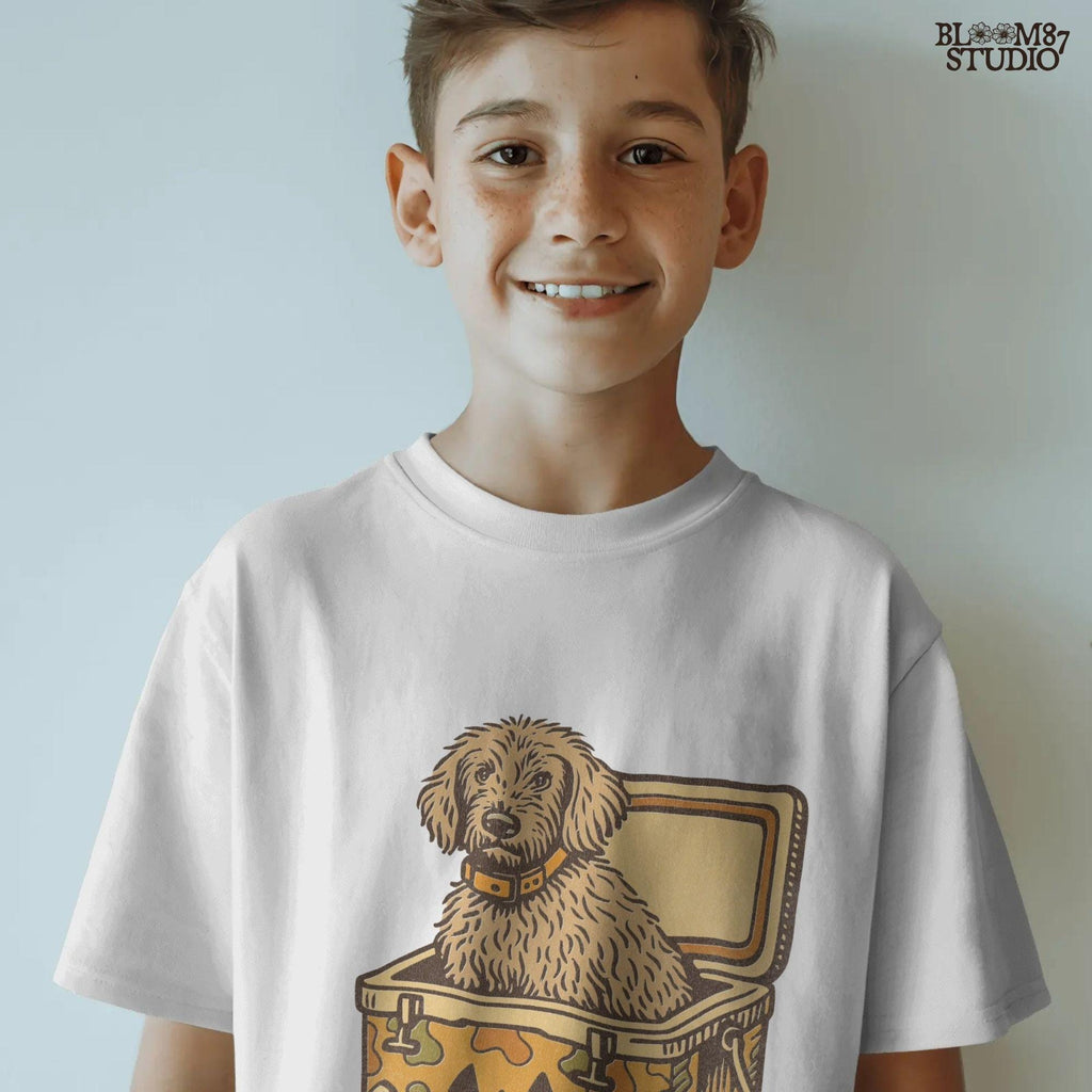 Cute golden doodle dog sitting in a Halloween camo cooler with jack-o’-lantern face, fall-themed sublimation graphic on transparent background.