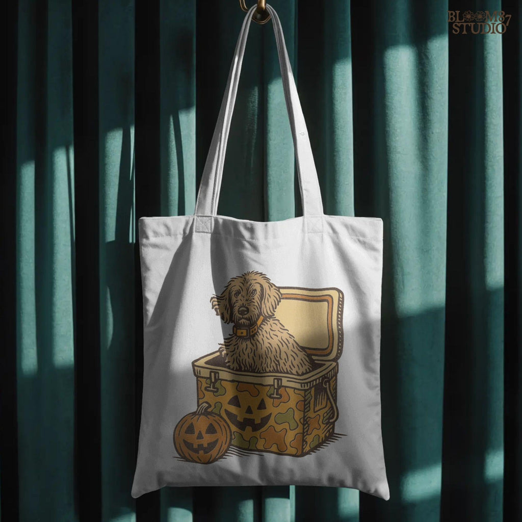 Cute golden doodle dog sitting in a Halloween camo cooler with jack-o’-lantern face, fall-themed sublimation graphic on transparent background.