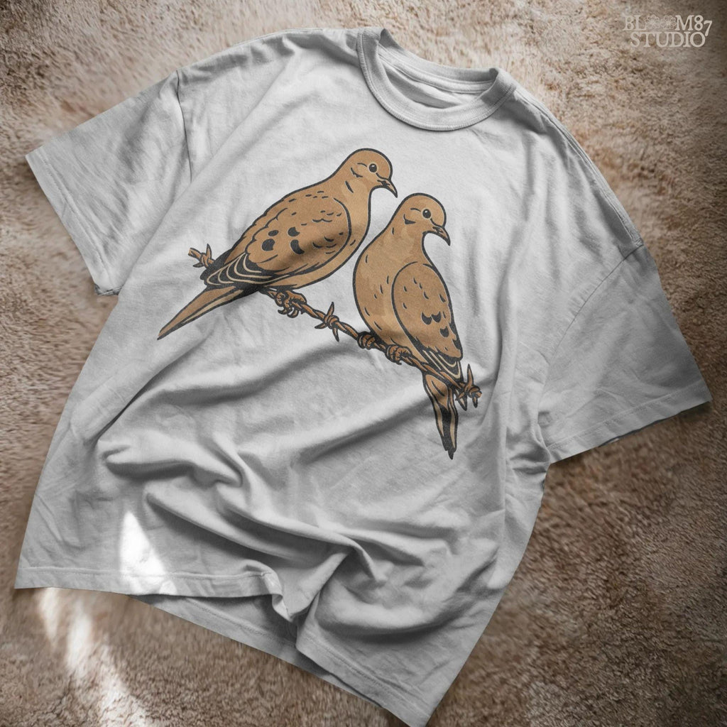 Two mourning doves perched on barbed wire, detailed rustic-style illustration, perfect for hunting season or southern country sublimation crafts.