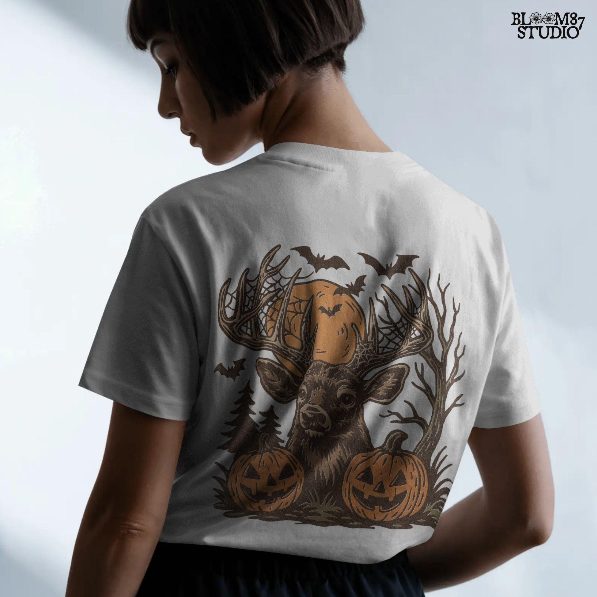 Halloween-themed sublimation PNG of a deer with spiderweb antlers, jack-o’-lantern pumpkins, bats, and a spooky forest background.