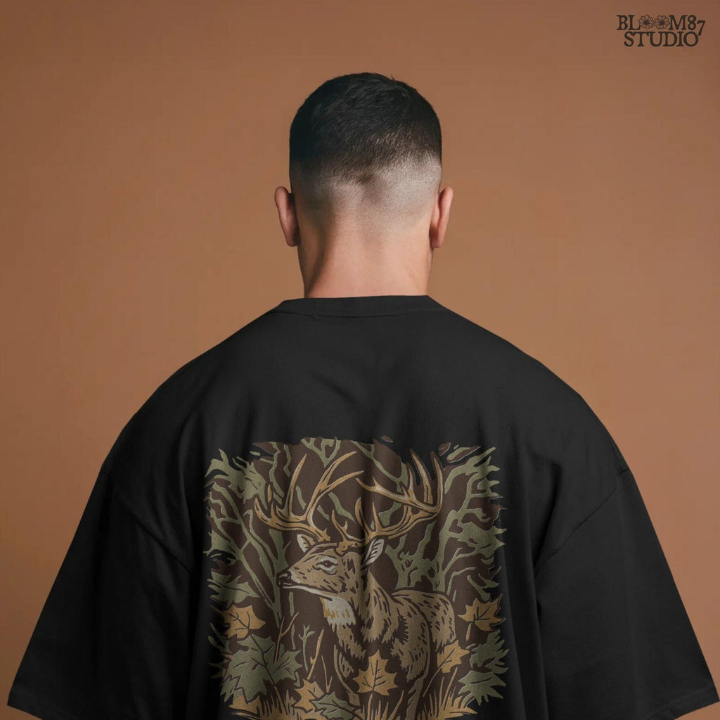 Illustration of a whitetail buck in a fall forest surrounded by autumn leaves, ideal for rustic sublimation or hunting-themed shirt design.