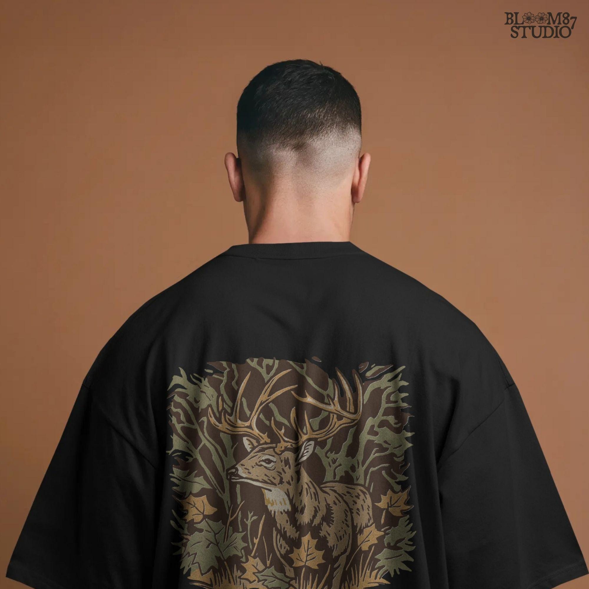 Illustration of a whitetail buck in a fall forest surrounded by autumn leaves, ideal for rustic sublimation or hunting-themed shirt design.