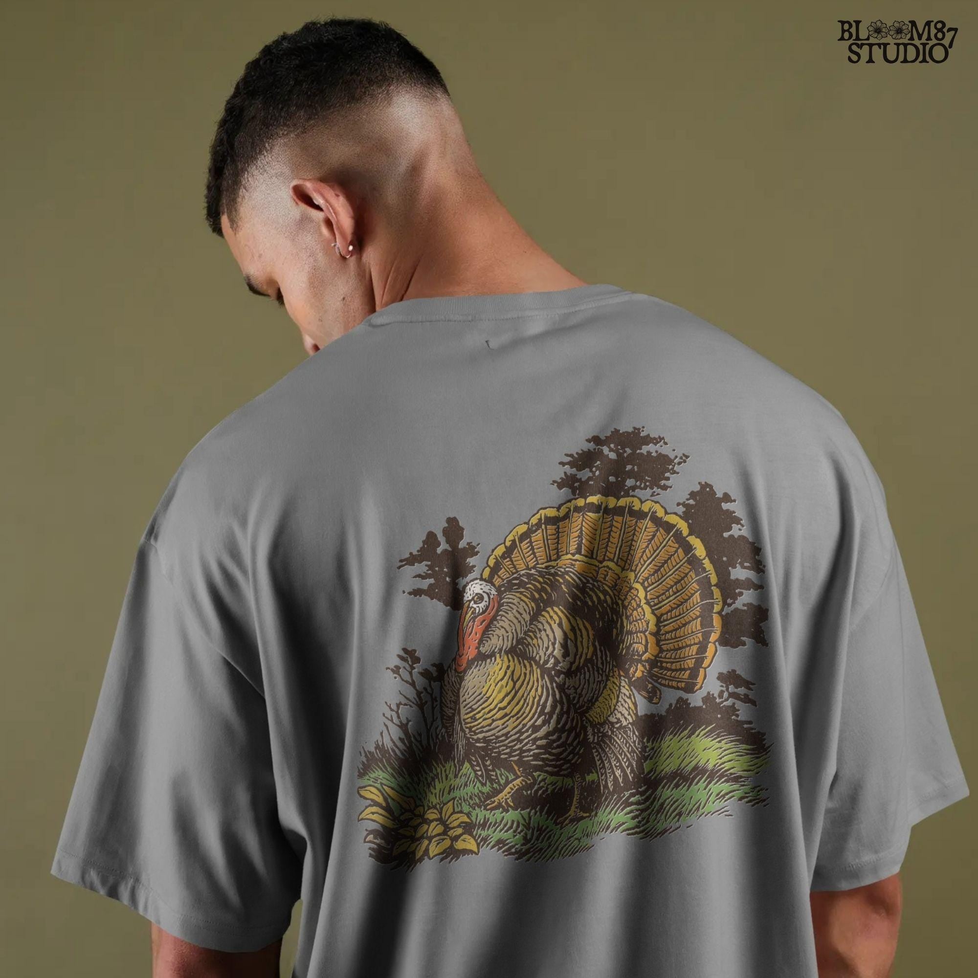 Vintage turkey illustration for Thanksgiving sublimation, featuring a detailed rustic tom turkey in fall colors with grass and leaves.