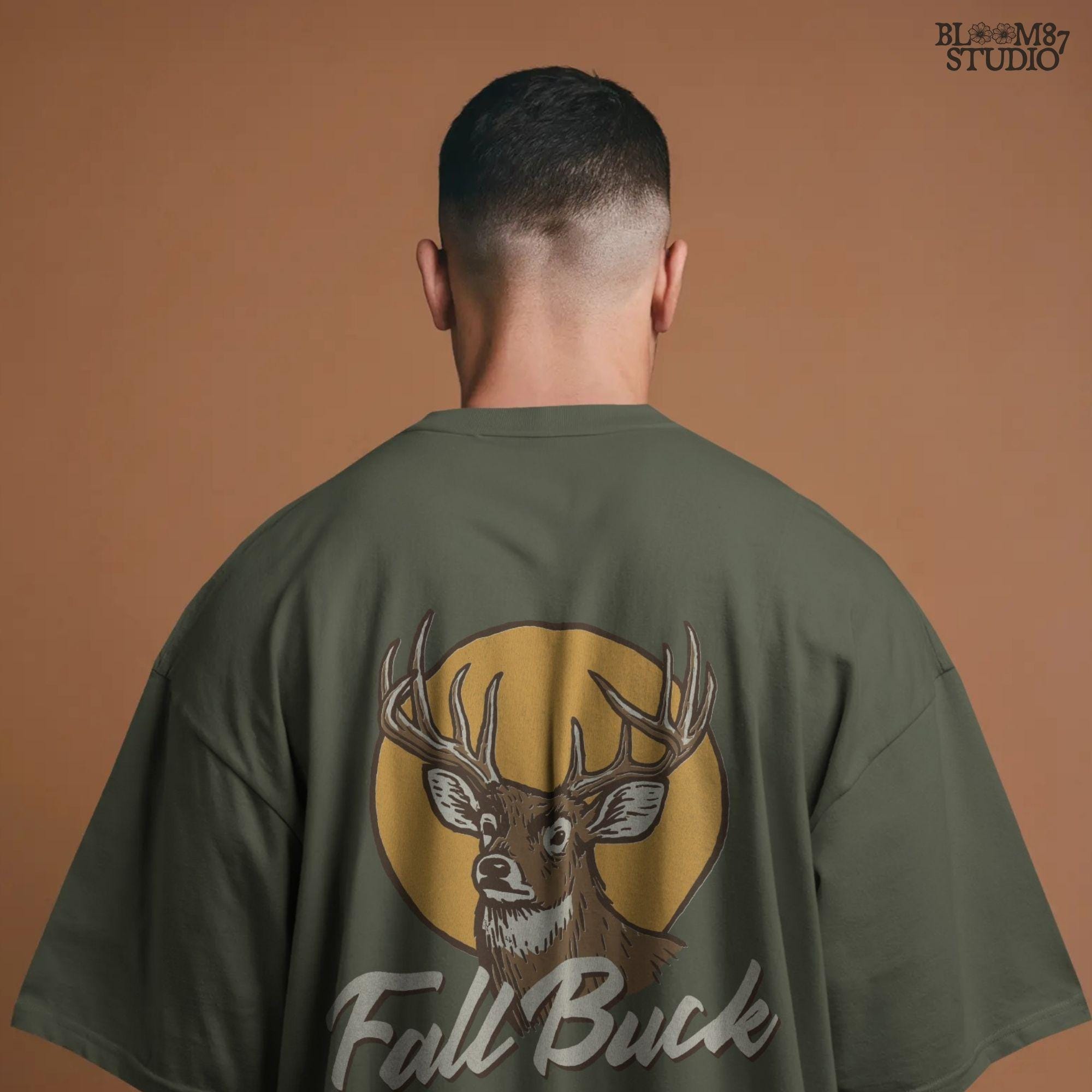 Illustration of a whitetail buck with antlers in front of a fall sun and the text “Fall Buck,” perfect for rustic hunting sublimation designs.