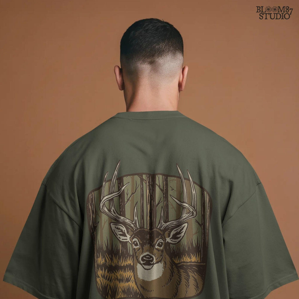 Illustration of a large whitetail buck with full antlers standing in a golden woodland forest, designed for hunting-themed sublimation projects.