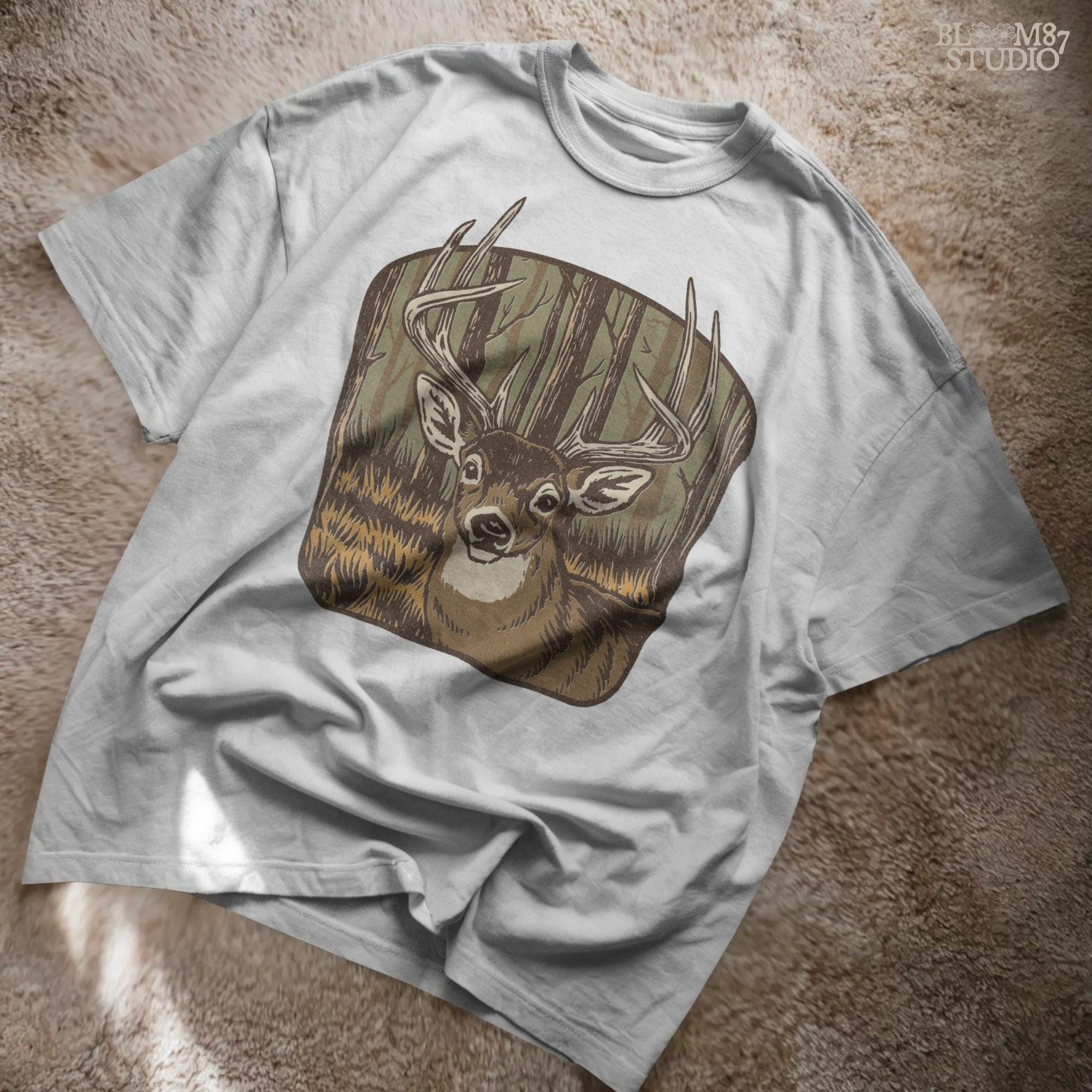 Illustration of a large whitetail buck with full antlers standing in a golden woodland forest, designed for hunting-themed sublimation projects.