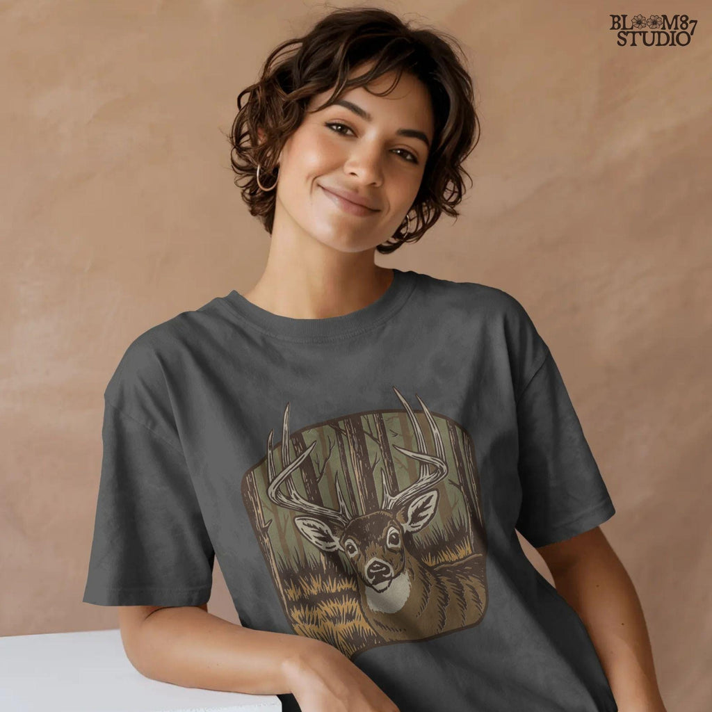 Illustration of a large whitetail buck with full antlers standing in a golden woodland forest, designed for hunting-themed sublimation projects.