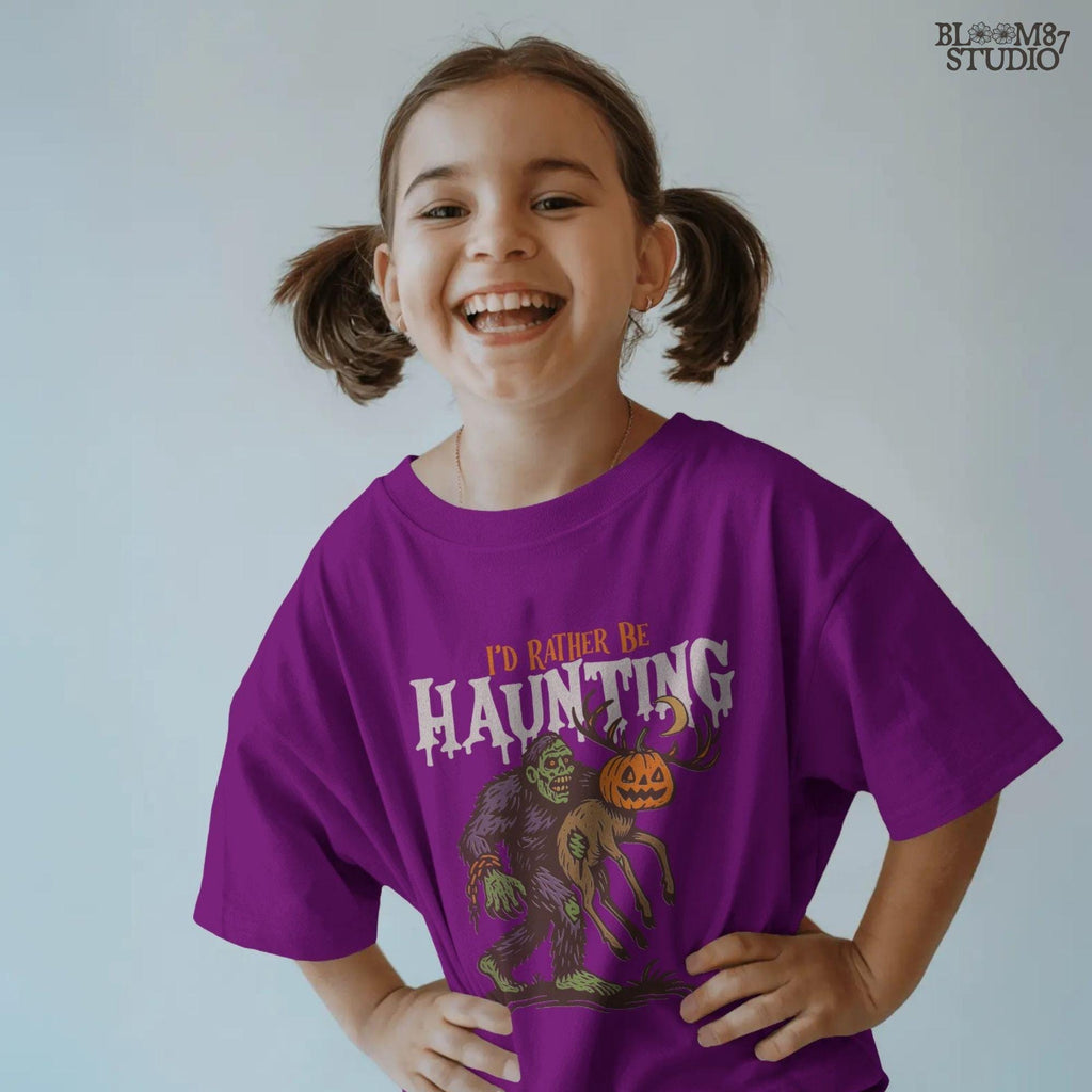 Humorous Halloween sublimation PNG featuring a zombie carrying a deer with a jack-o’-lantern head and the phrase “I’d Rather Be Haunting.”